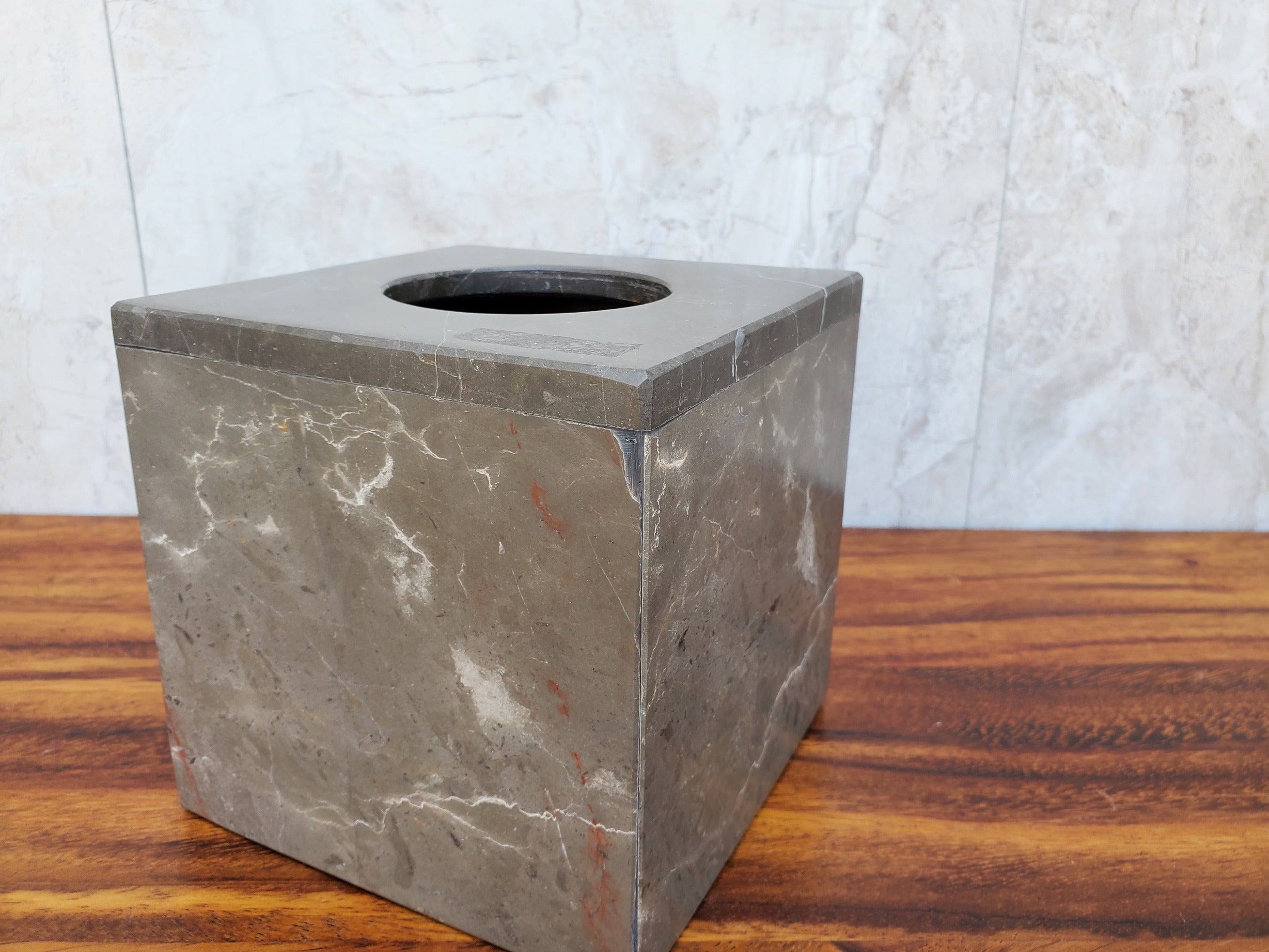 Square Gray Marble Tissue Box Cover with White Veining. Created from a single block of stone. Handmade in Mexico. Ships from the USA. Buy now at www.felipeandgrace.com.
