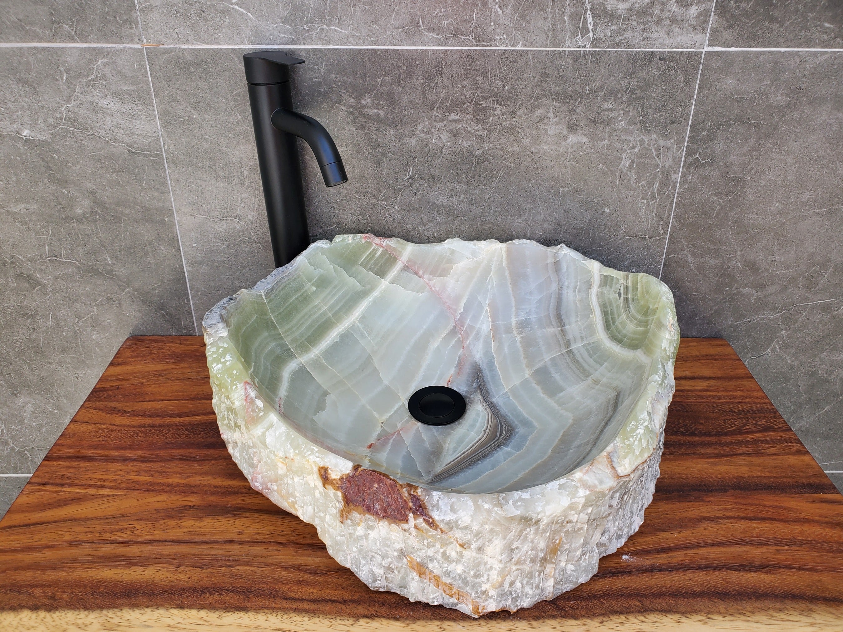 Green Onyx Stone Vessel Bathroom Sink. Above Counter. It is one of a kind and a beautiful work of art. Handmade in Mexico. Hand Finished in the USA. Ships from the USA. Buy now at www.felipeandgrace.com. 