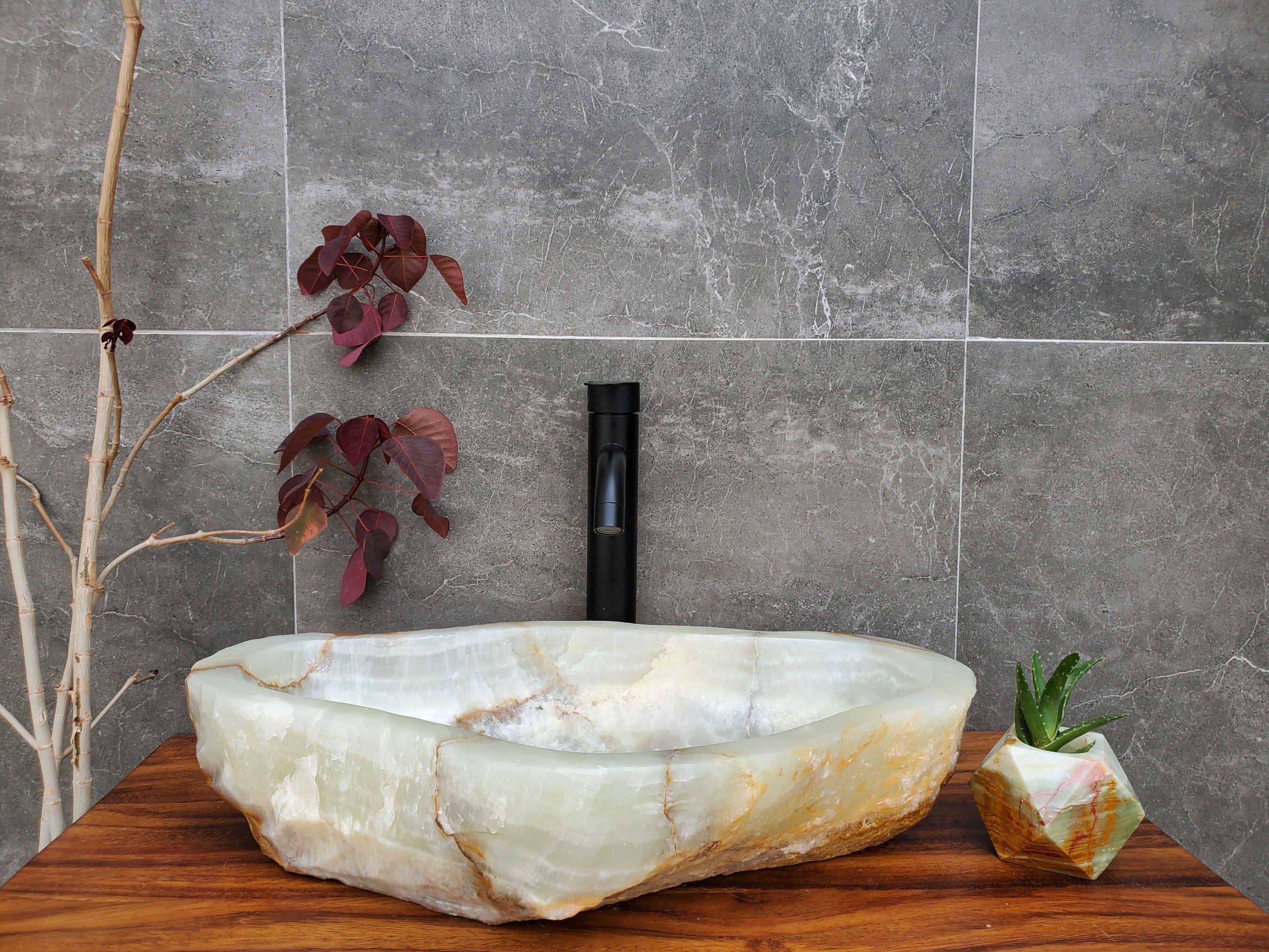 Green Onyx Stone Vessel Bathroom Sink. Above Counter. It is one of a kind and a beautiful work of art. Handmade in Mexico. Hand Finished in the USA. Ships from the USA. Buy now at www.felipeandgrace.com. 