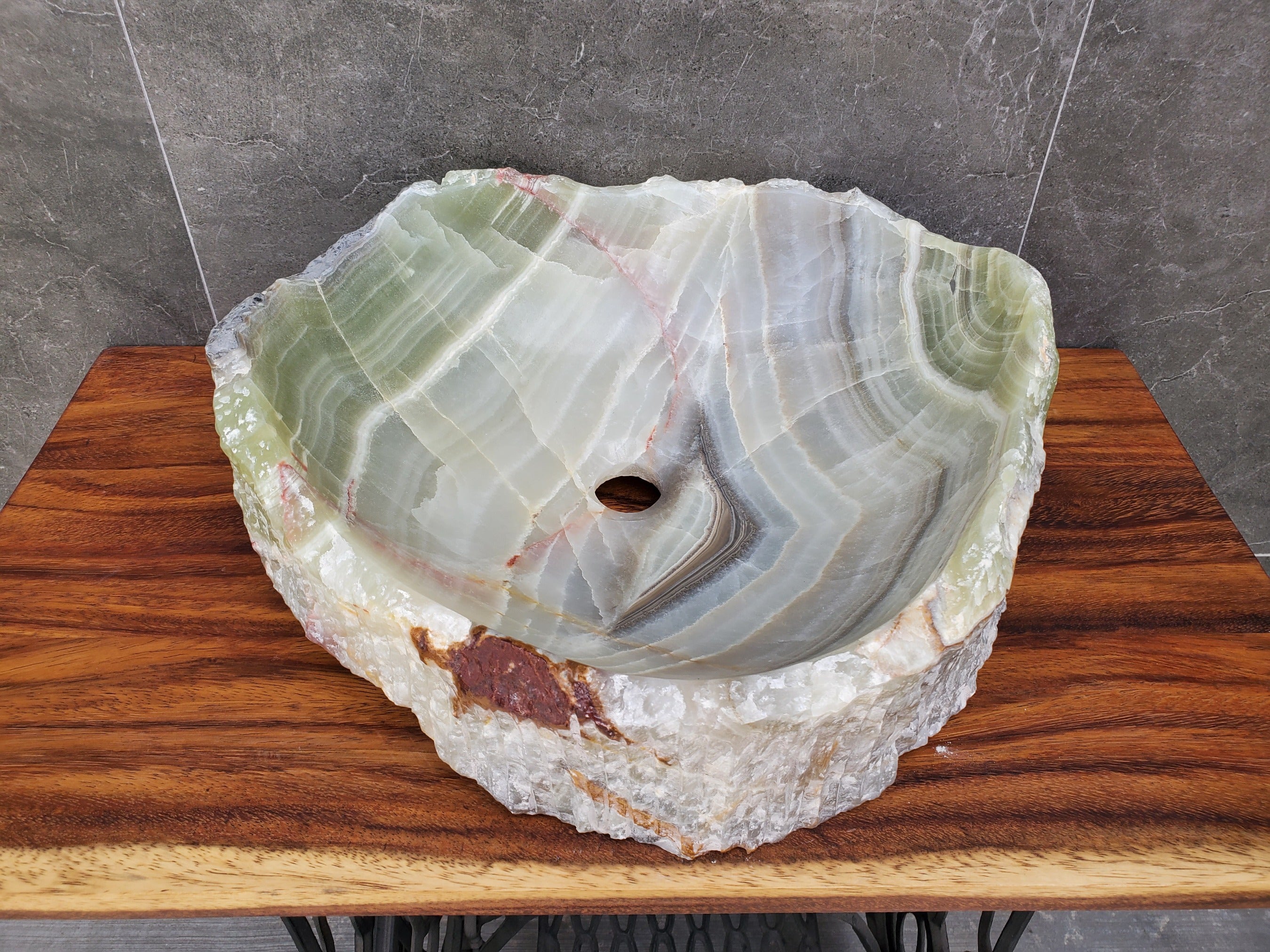 Green Onyx Stone Vessel Bathroom Sink. Above Counter. It is one of a kind and a beautiful work of art. Handmade in Mexico. Hand Finished in the USA. Ships from the USA. Buy now at www.felipeandgrace.com. 