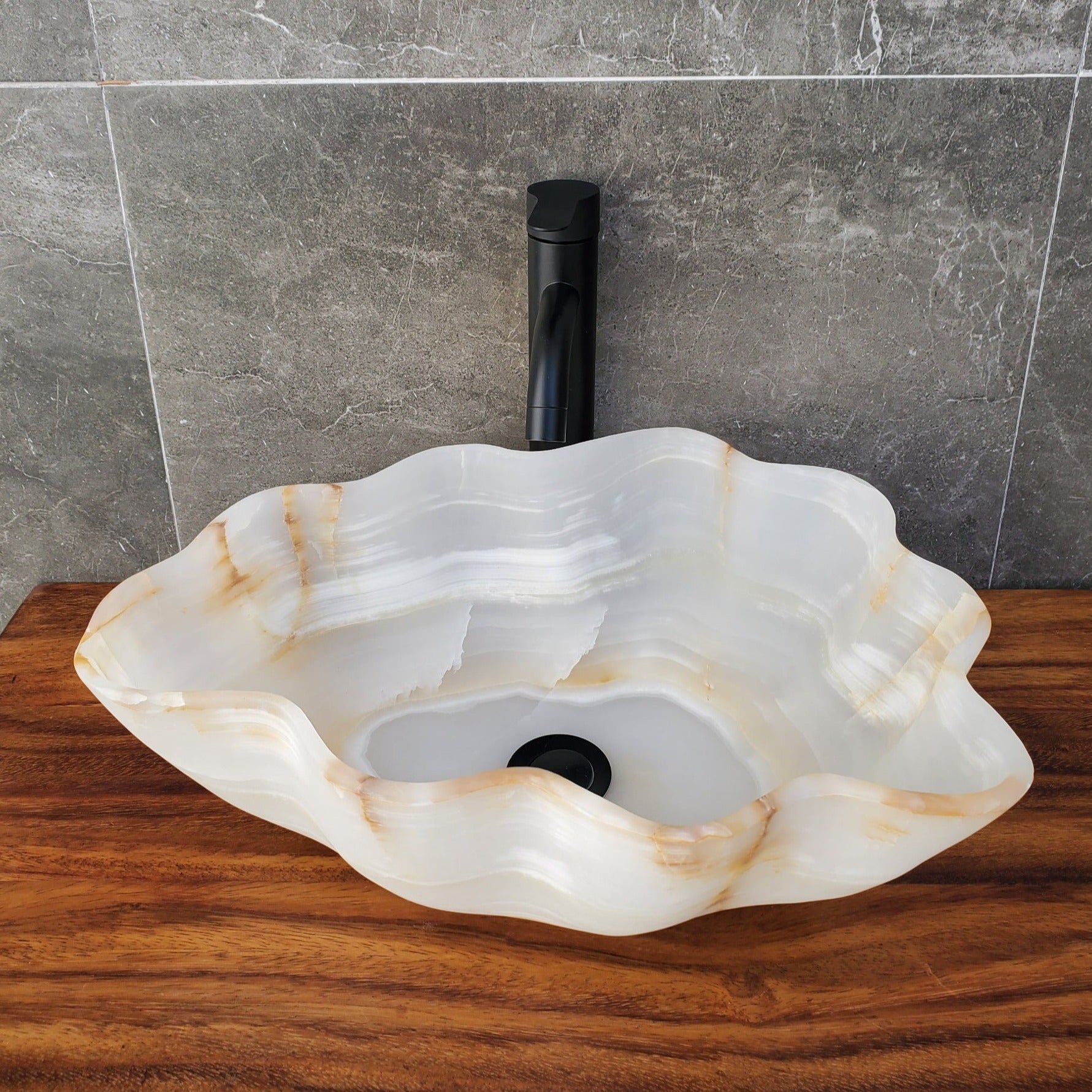 Transparent Onyx Stone Bathroom Vessel Sink. Epoxy Sealant is available Fast shipping. Standard drain size. A beautiful work of art. Handmade. Buy Now at www.felipeandgrace.com.