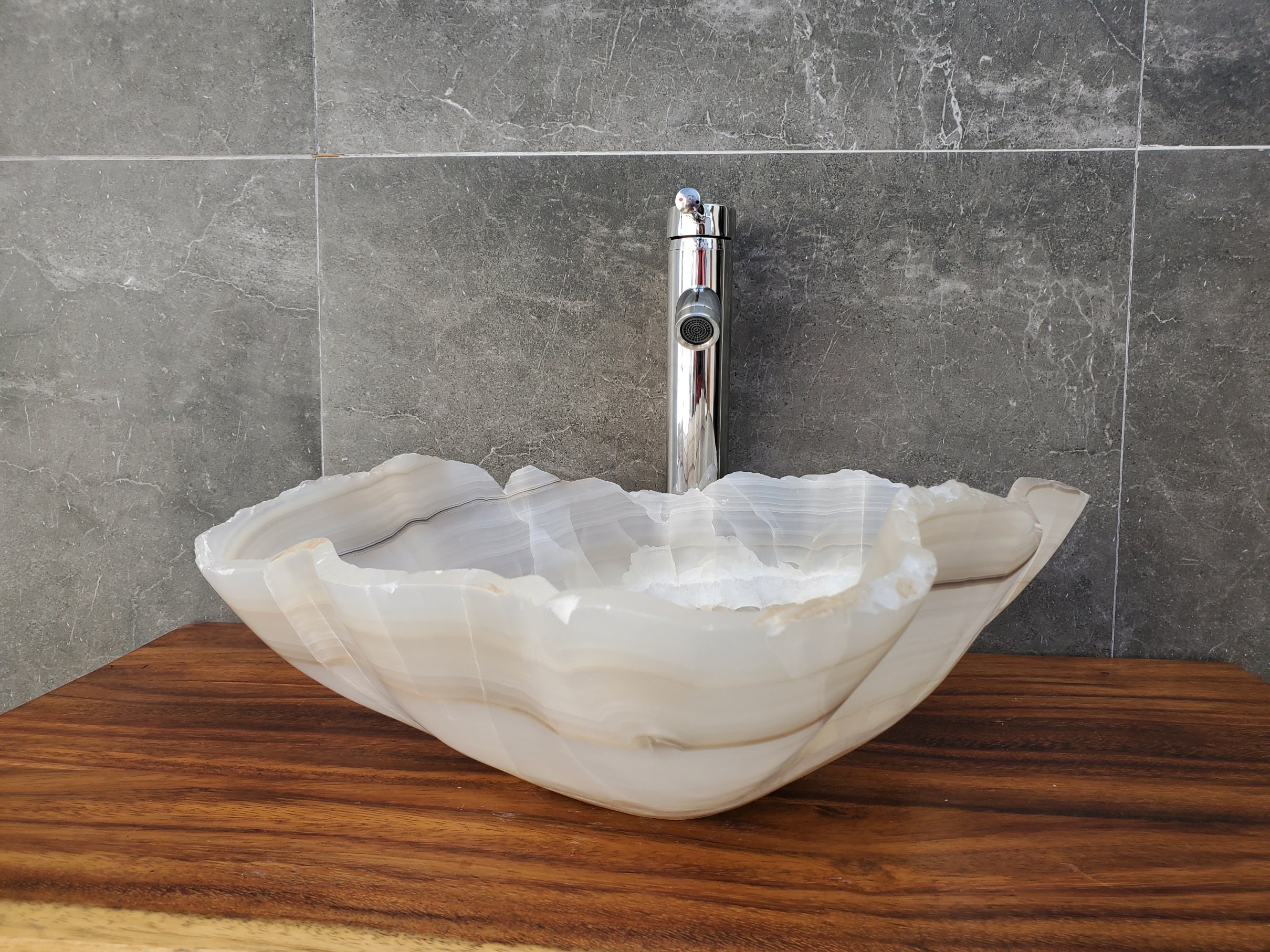 Transparent Onyx Stone Bathroom Vessel Sink. Epoxy Sealant is available Fast shipping. Standard drain size. A beautiful work of art. Handmade. Buy Now at www.felipeandgrace.com.