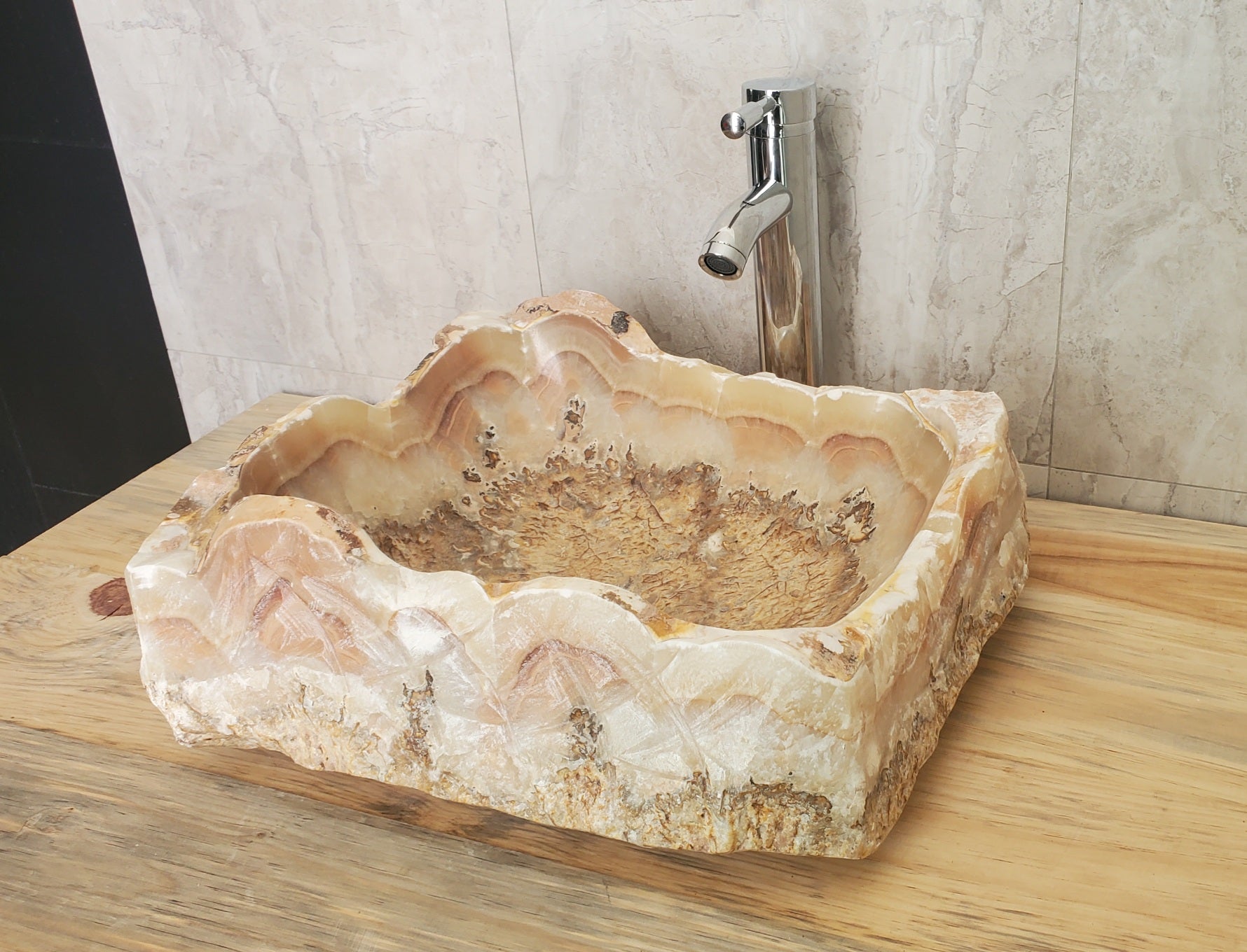Brown and Tan Onyx Stone  Bathroom Vessel Sink. Epoxy Sealant is available with fast shipping. Standard drain size. A beautiful work of rustic art. Handmade. Buy Now at www.felipeandgrace.com