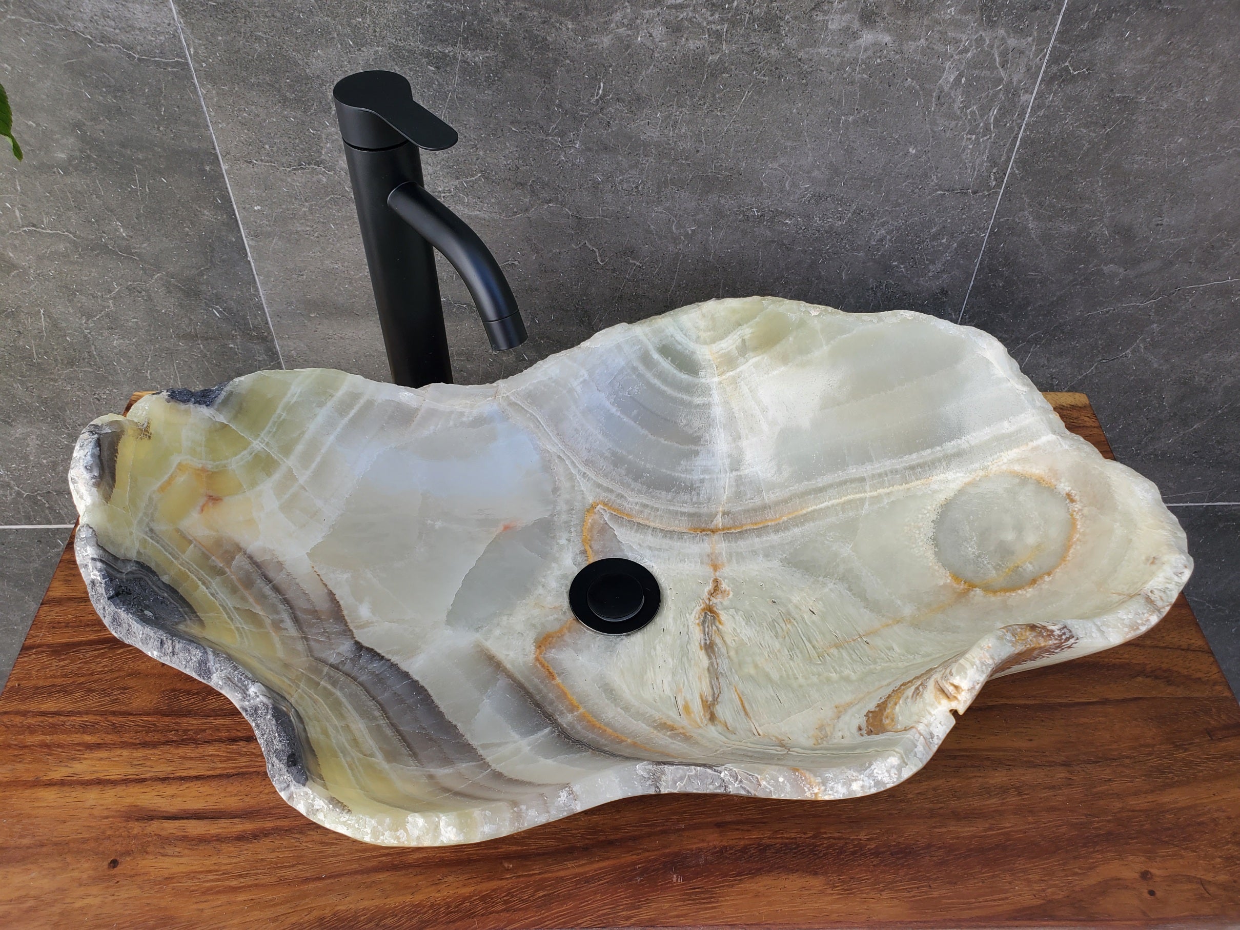 Green Onyx Stone Bathroom Vessel Sink. Epoxy Sealant is available with fast shipping. Standard drain size. A beautiful work of art. Handmade. Buy Now at www.felipeandgrace.com.