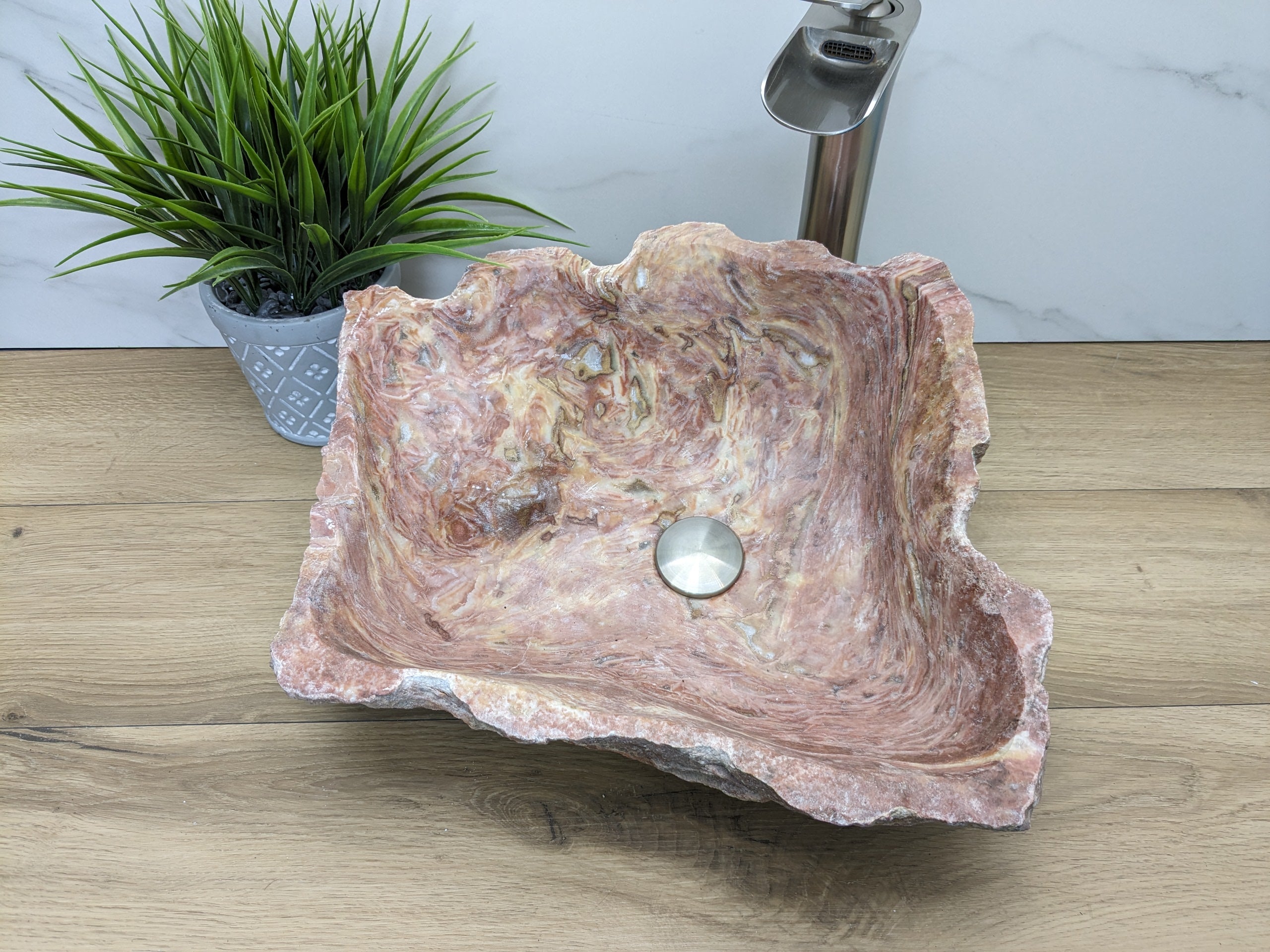 Pink and Tan Onyx Stone Vessel Sink. Custom Drain Size. Handmade in Mexico. We hand finish, package, and ship from the USA. Buy now at www.felipeandgrace.com. 