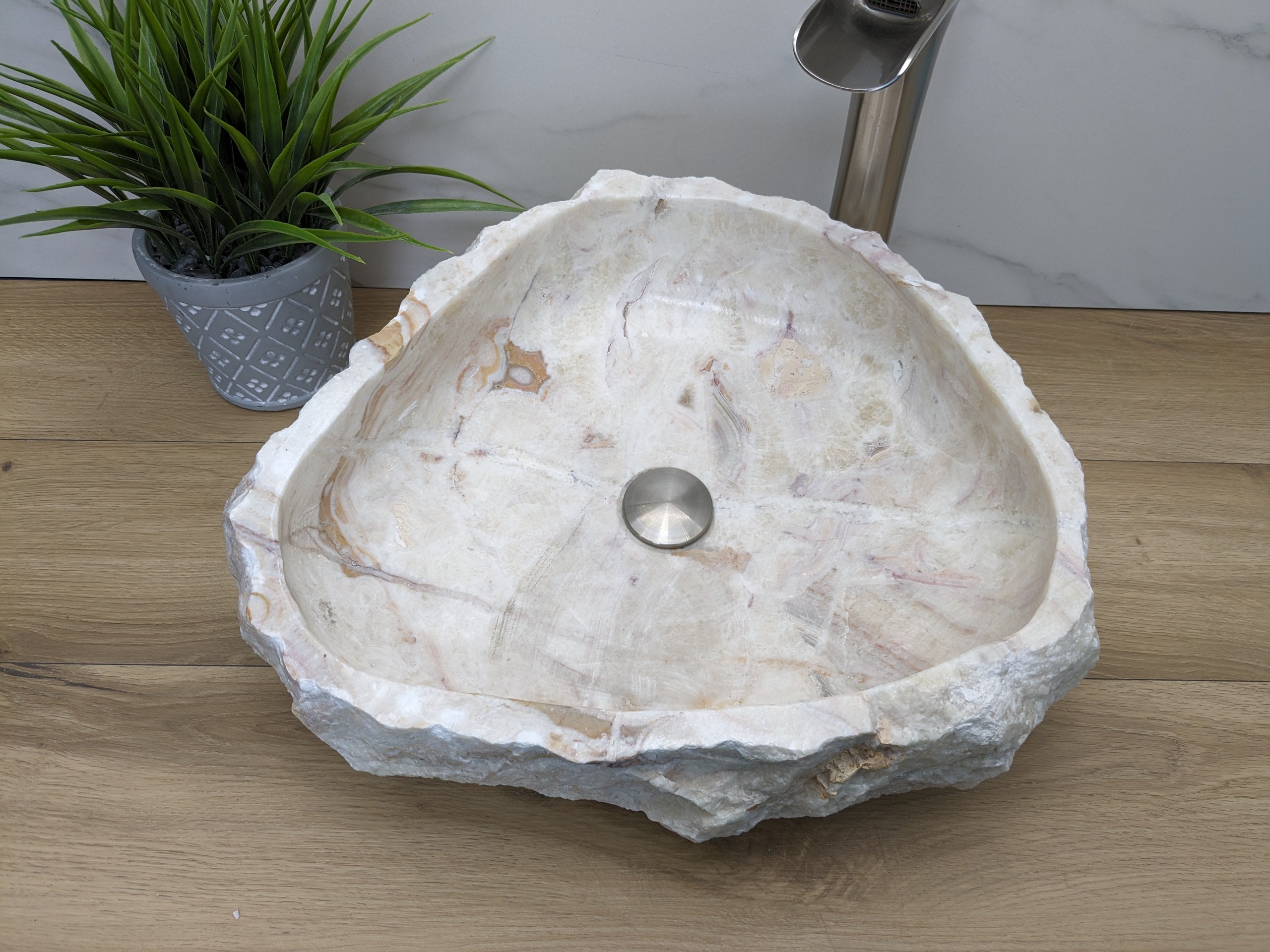 White and Cream Onyx Rustic Bathroom Vessel Sink. A beautiful work of art. We offer fast shipping. Handmade in Mexico. We hand finish, package, and ship from the USA. Buy now at www.felipeandgrace.com. 