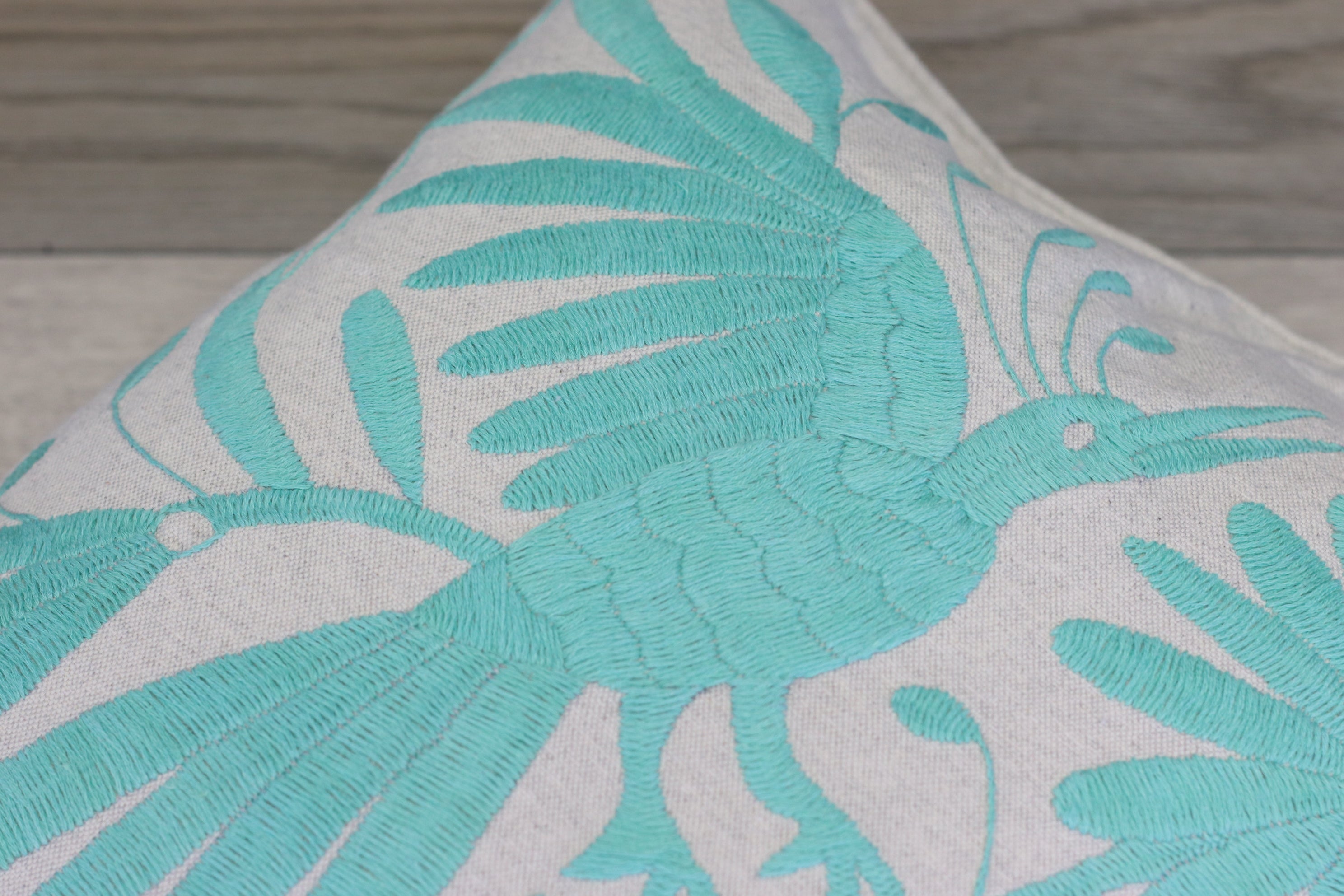 Aqua Blue Bird and Flowers Embroidered Pillow Cover with Gray Background. Handmade in Mexico. Ships from the USA. Buy now at www.felipeandgrace.com. 