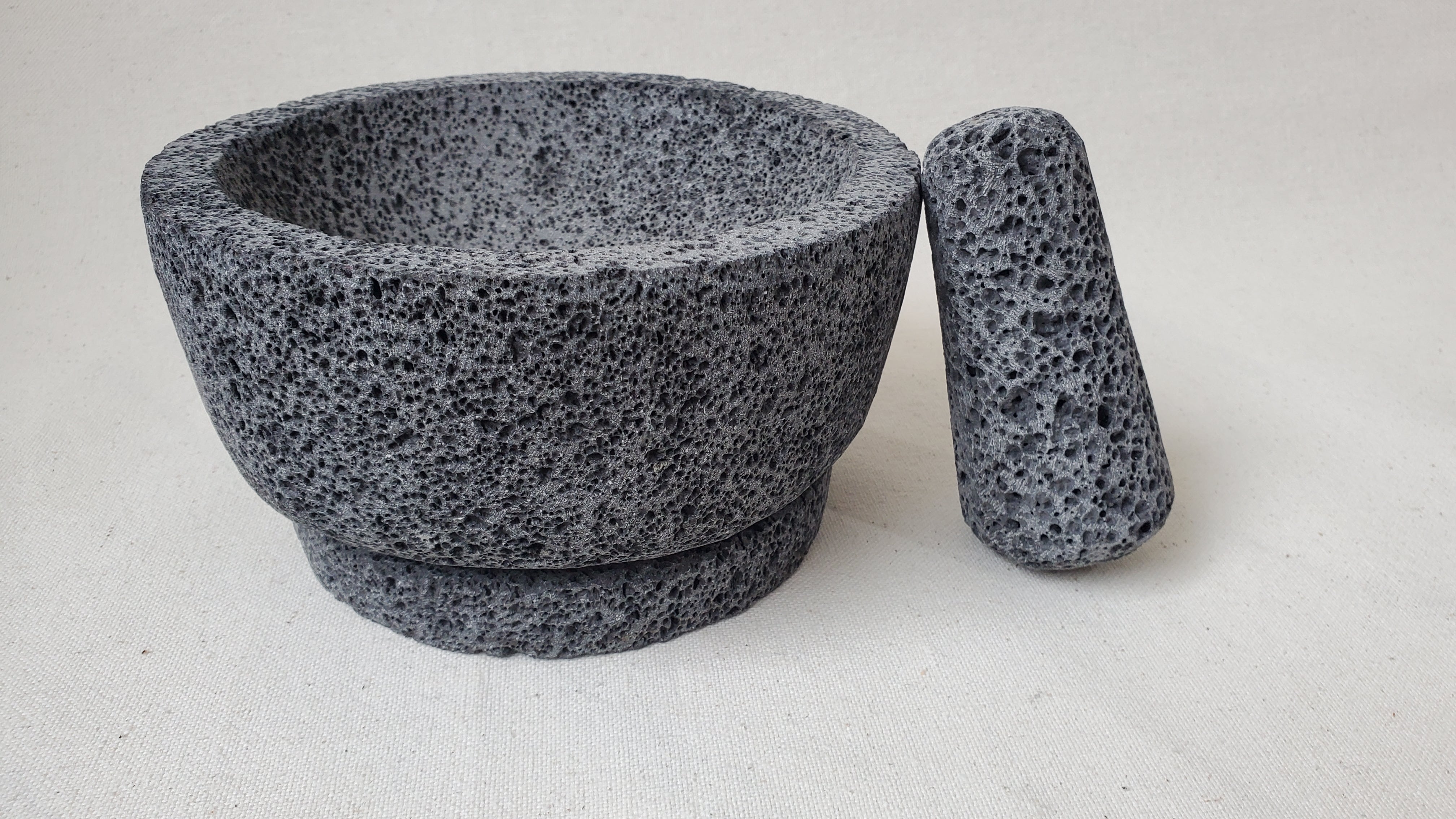 Authentic 8-inch Molcajete Pestle and Mortar Set. Made of pure basalt volcanic lava rock. Handmade in Mexico using traditional techniques. We hand finish, package, and ship from the USA. Buy now at www.felipeandgrace.com.