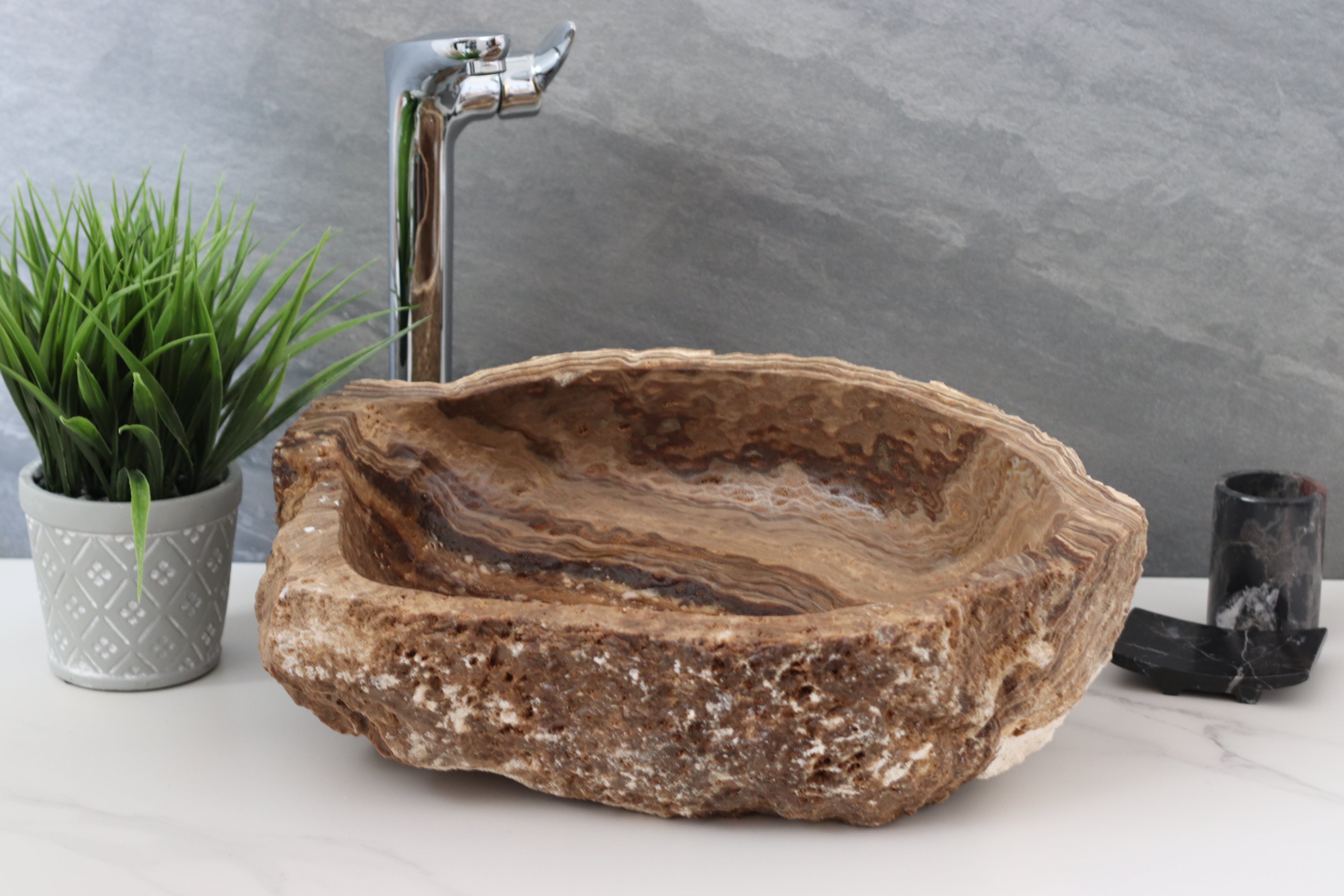 Epoxy Coated Dark Brown and Beige Onyx Vessel Sink. Handmade in Mexico. We hand finish, package, and ship from the USA. Buy now at www.felipeandgrace.com. 