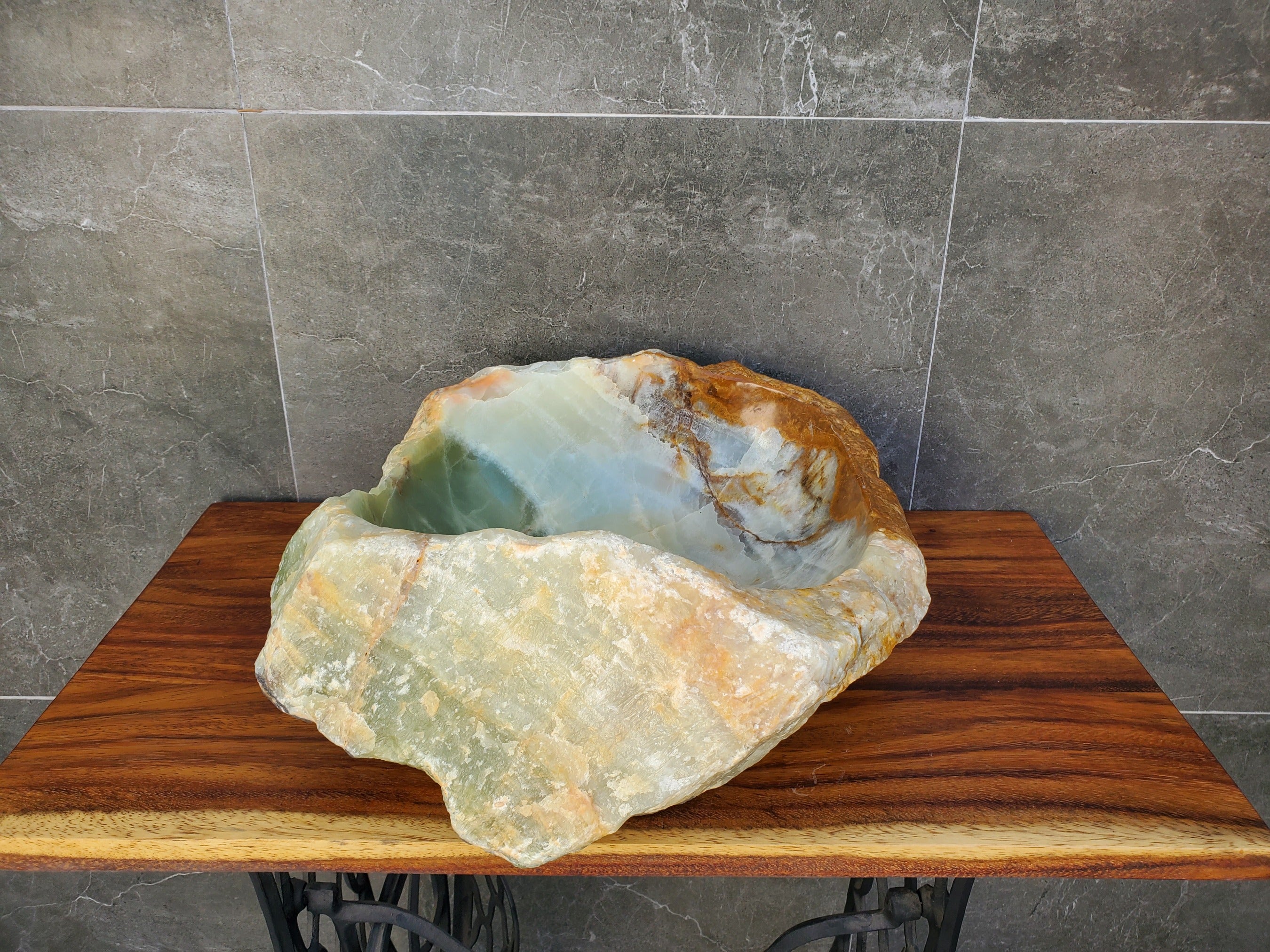 Green and Brown Onyx Stone Vessel Bathroom Sink. Above Counter. It is one of a kind and a beautiful work of art. Handmade in Mexico. Hand Finished in the USA. Ships from the USA. Buy now at www.felipeandgrace.com. 