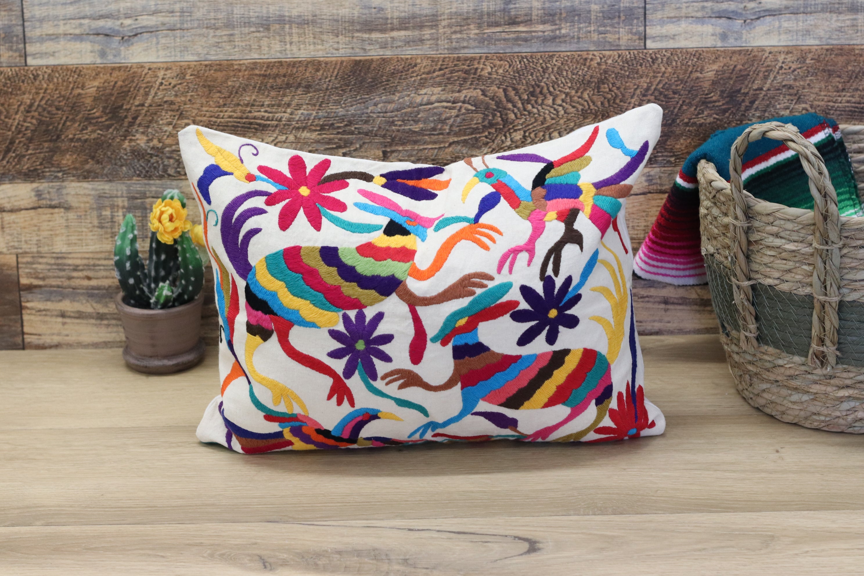 Otomi Tenango Pillow Cover, Throw Pillows, Mexican Hand Embroidered Textile Art. Flowers and Animals, Beige with Multicolor Thread. Handmade. Buy Now at www.felipeandgrace.com.