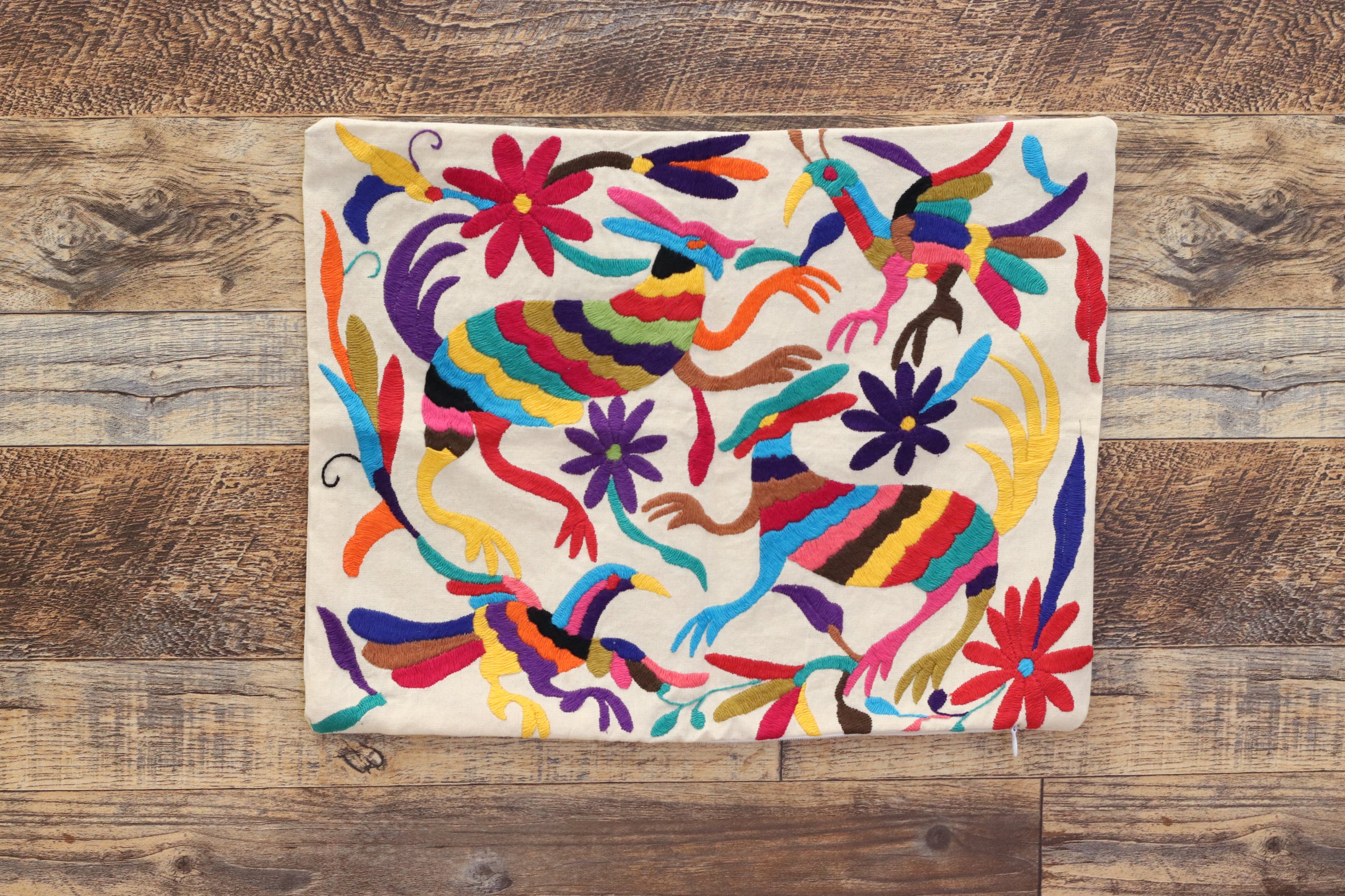 Otomi Tenango Pillow Cover, Throw Pillows, Mexican Hand Embroidered Textile Art. Flowers and Animals, Beige with Multicolor Thread. Handmade. Buy Now at www.felipeandgrace.com.
