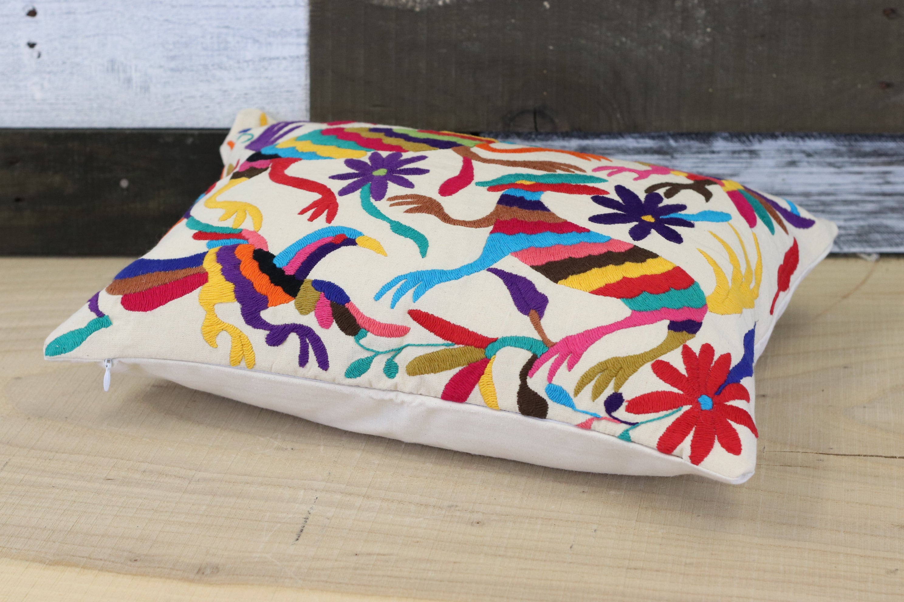 Otomi Tenango Pillow Cover, Throw Pillows, Mexican Hand Embroidered Textile Art. Flowers and Animals, Beige with Multicolor Thread. Handmade. Buy Now at www.felipeandgrace.com.