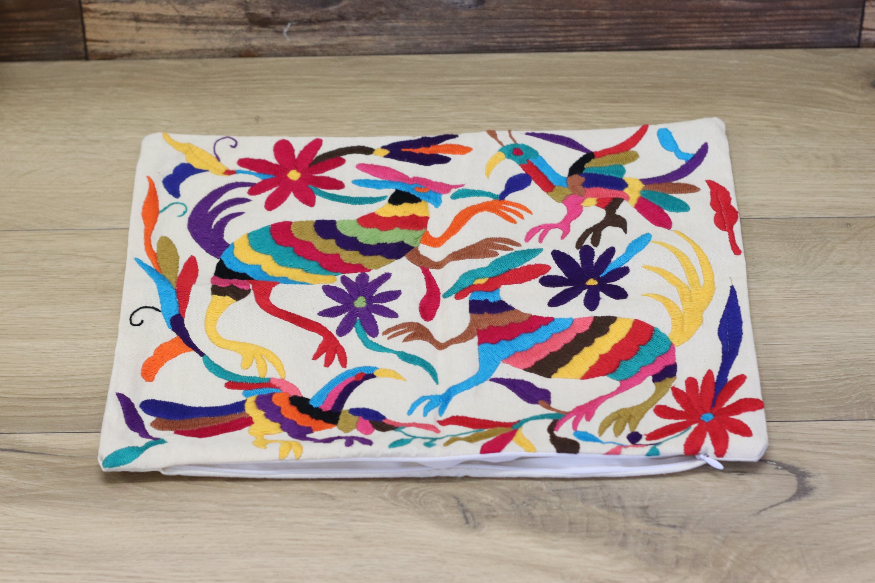 Otomi Tenango Pillow Cover, Throw Pillows, Mexican Hand Embroidered Textile Art. Flowers and Animals, Beige with Multicolor Thread. Handmade. Buy Now at www.felipeandgrace.com.