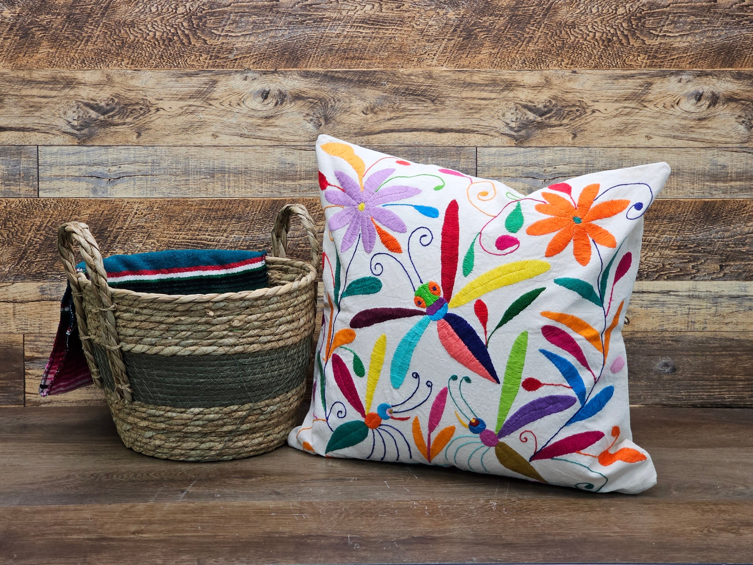 Square Otomi Tenango Pillow Cover with Hand Embroidered Dragonfly and Flower Design in Vibrant Colors. Handmade in Mexico. Ships from the USA. Buy now at www.felipeandgrace.com.