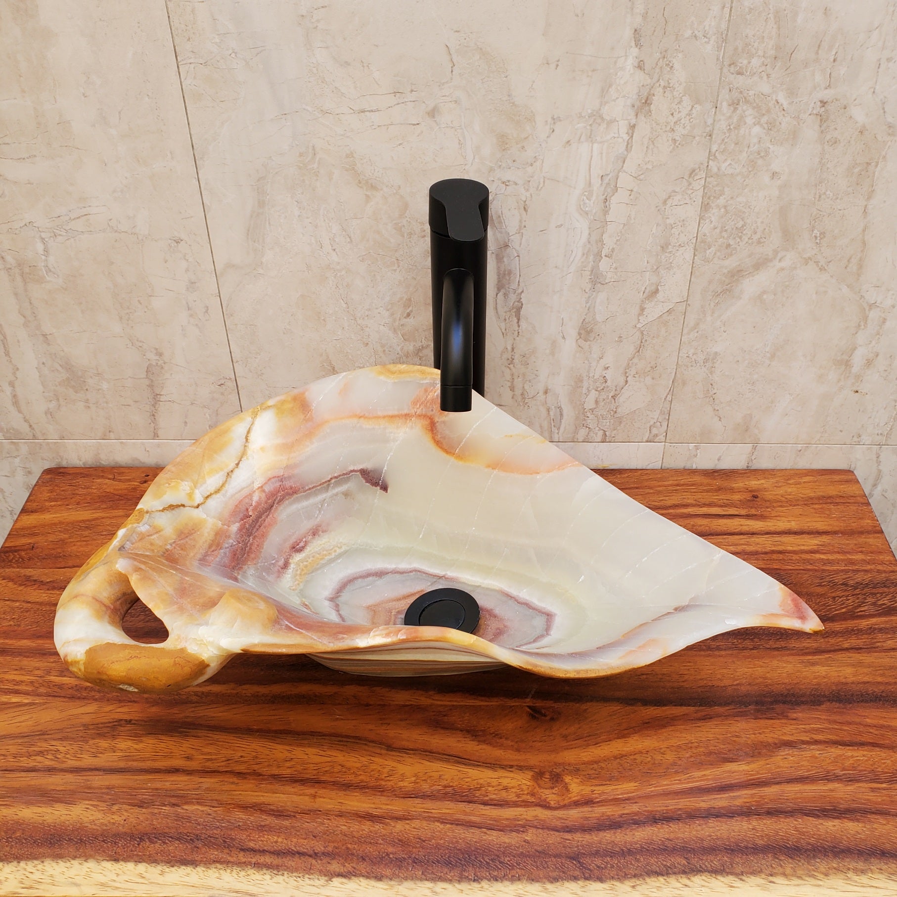 Green and Brown Onyx Vessel Sink. Handmade in Mexico. Hand-finished and ships from the USA. Buy now at www.felipeandgrace.com.