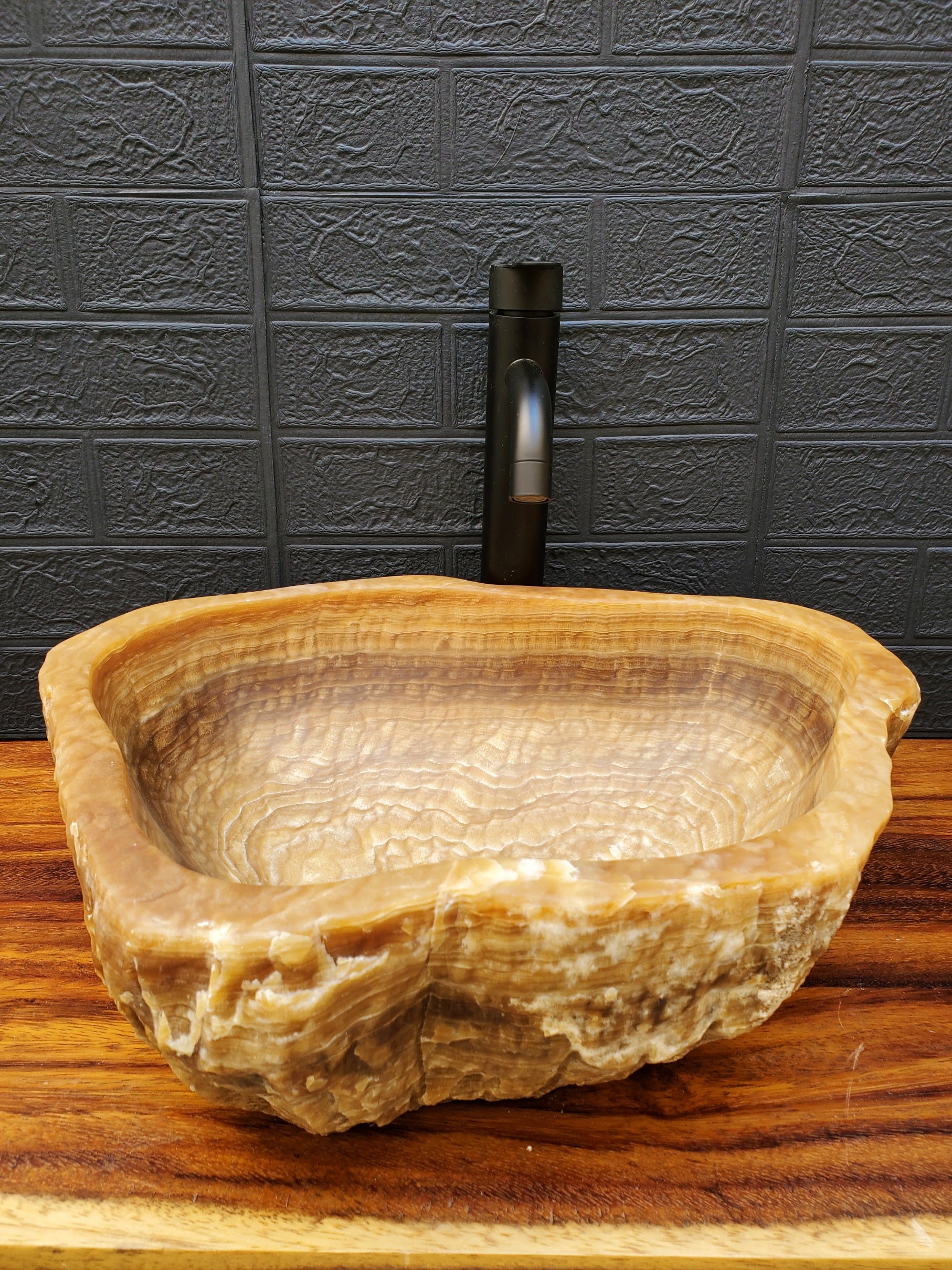 White and Brown Onyx Stone Vessel Sink. It is a one-of-a-kind beautiful work of art. Handmade in Mexico and hand-finished in the USA. Buy now at www.felipeandgrace.com. 