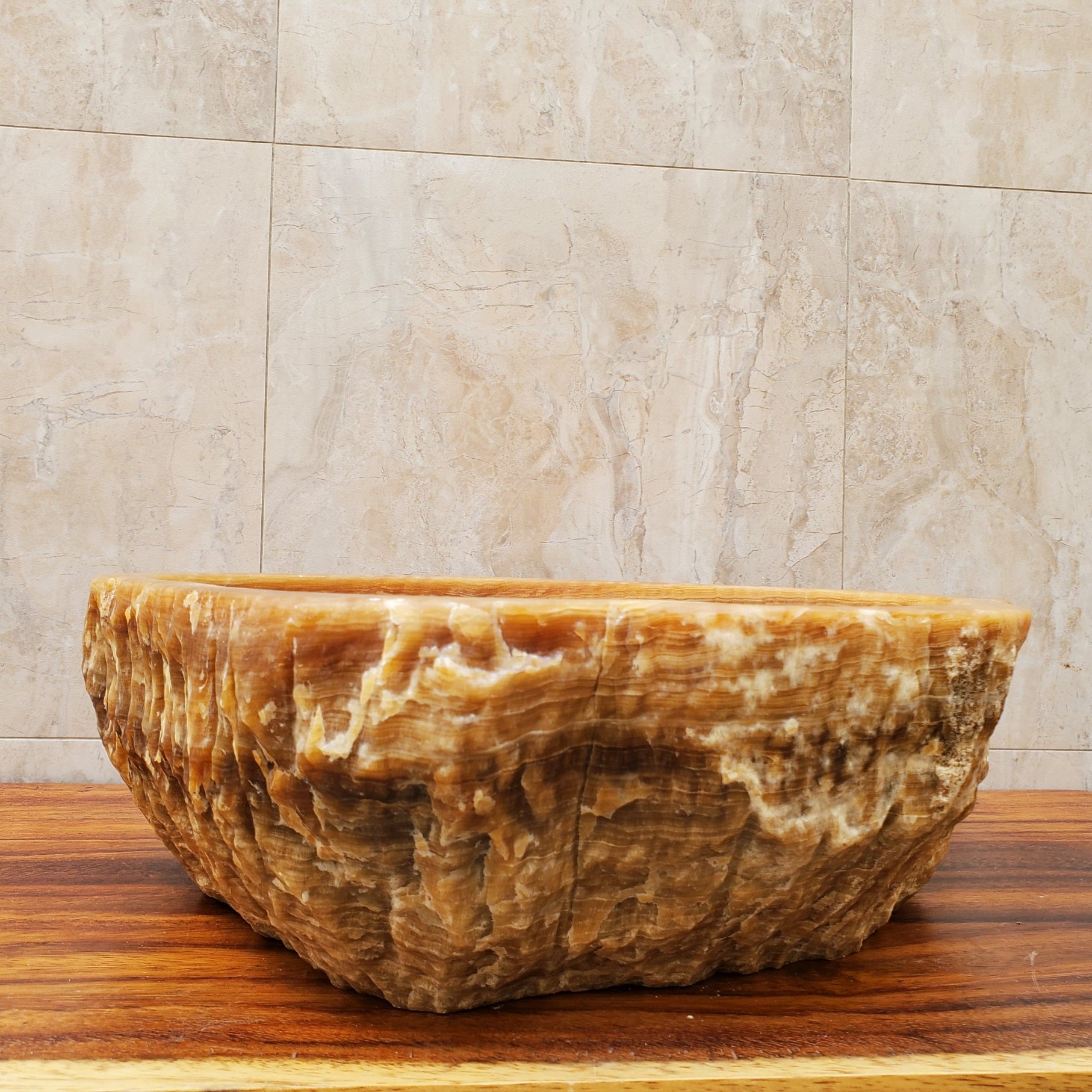 White and Brown Onyx Stone Vessel Sink. It is a one-of-a-kind beautiful work of art. Handmade in Mexico and hand-finished in the USA. Buy now at www.felipeandgrace.com. 