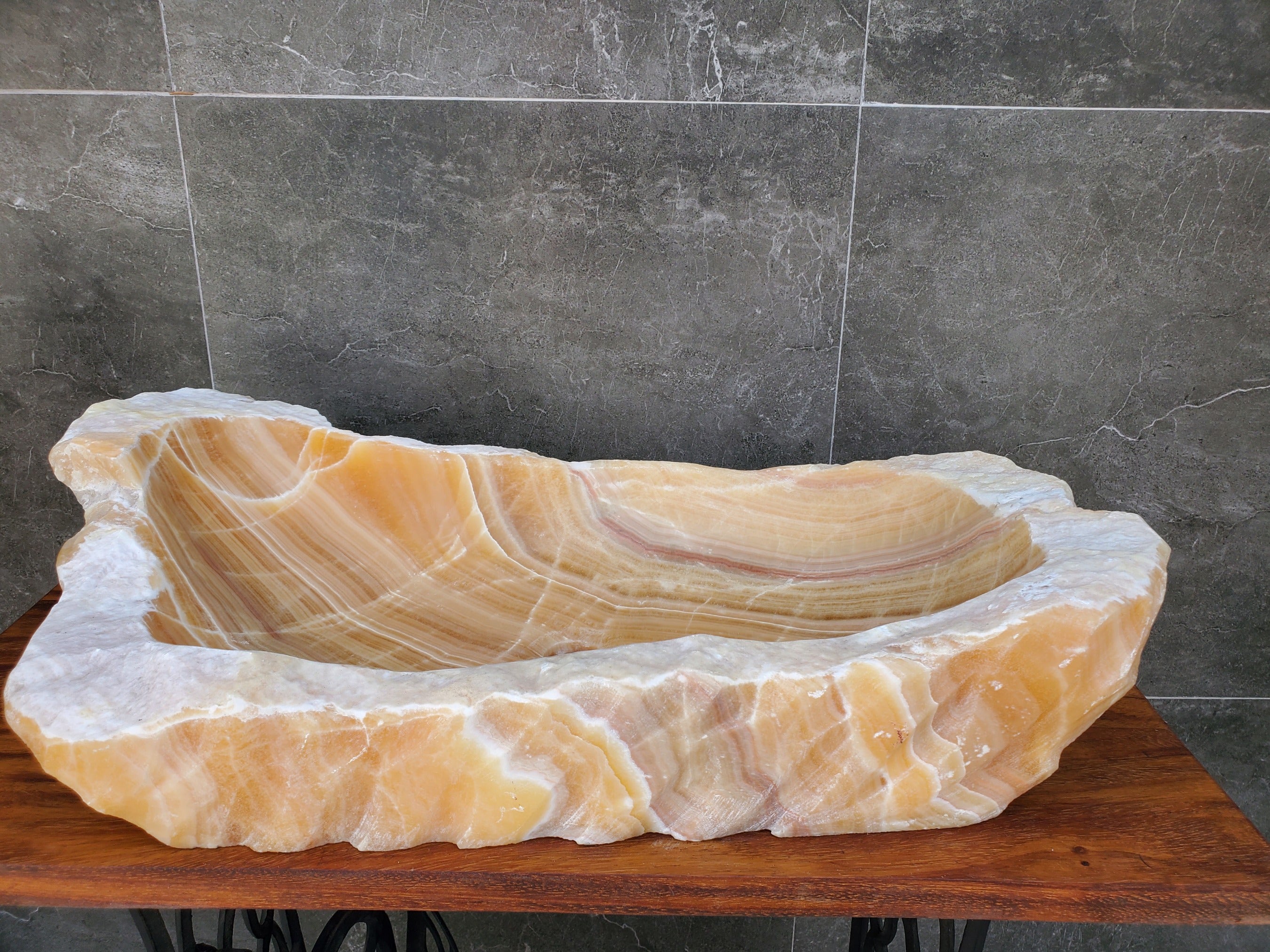 Orange Onyx Stone Vessel Sink with White Lines. Handmade in Mexico. Ships from the USA. Buy now at www.felipeandgrace.com. 