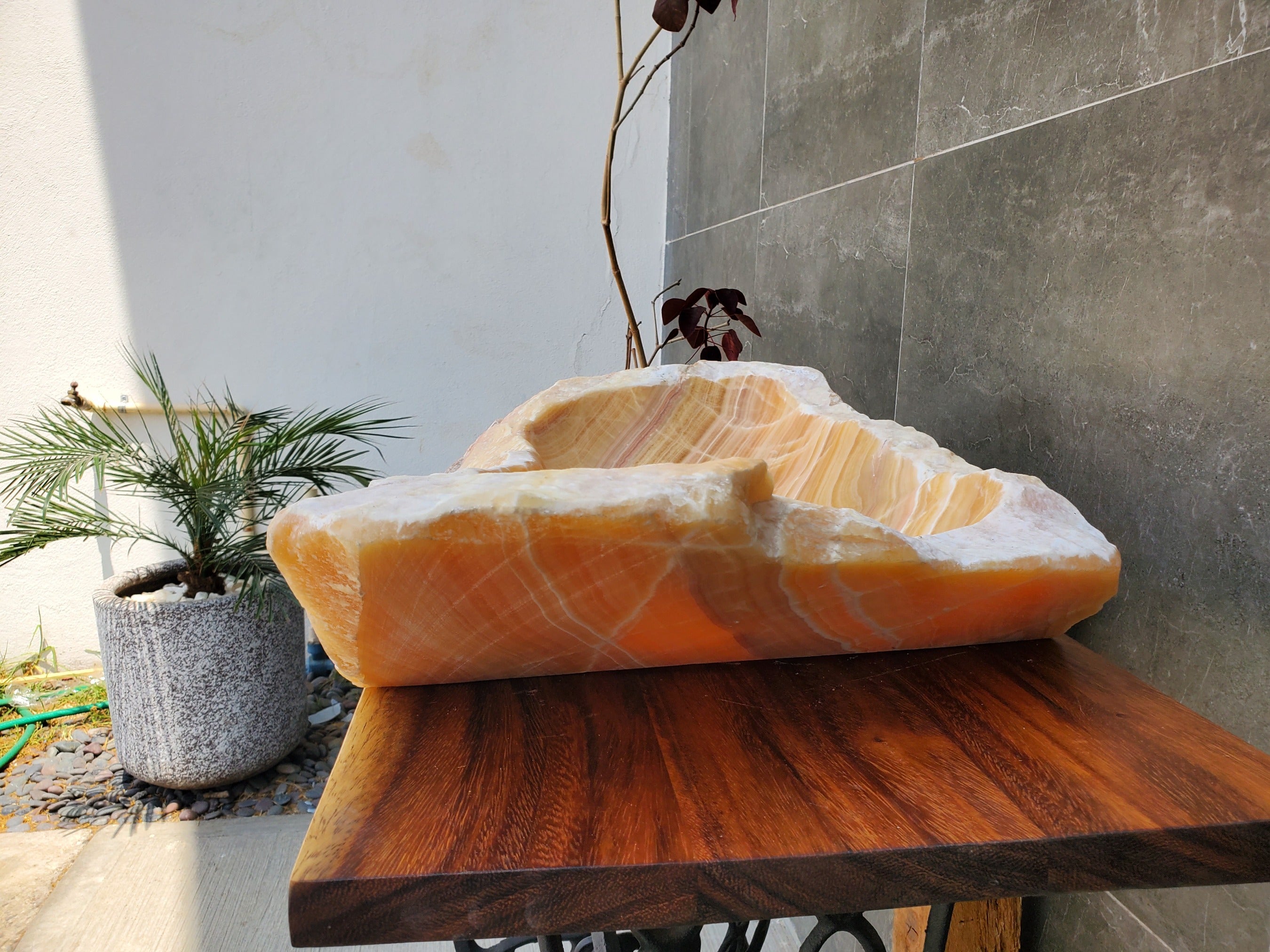 Orange Onyx Stone Vessel Sink with White Lines. Handmade in Mexico. Ships from the USA. Buy now at www.felipeandgrace.com. 