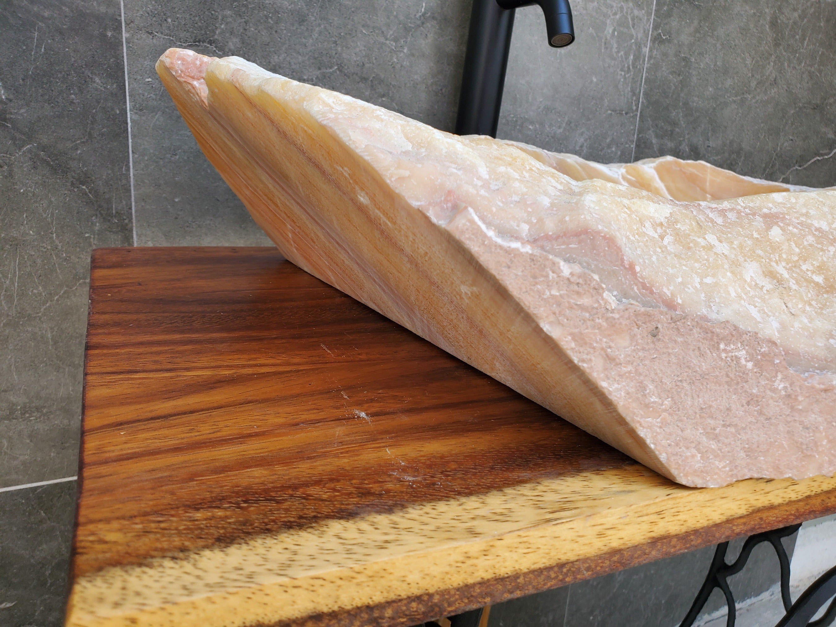 Orange Onyx Stone Vessel Sink with White Lines. Handmade in Mexico. Ships from the USA. Buy now at www.felipeandgrace.com. 