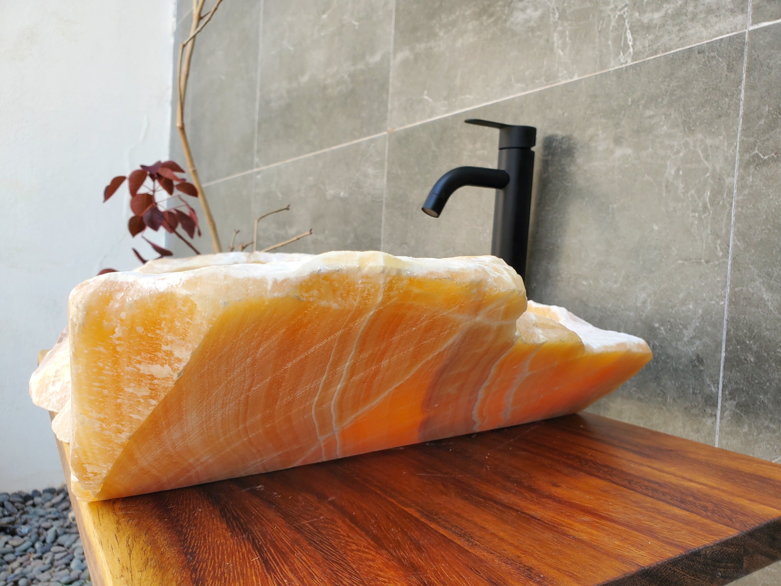 Orange Onyx Stone Vessel Sink with White Lines. Handmade in Mexico. Ships from the USA. Buy now at www.felipeandgrace.com. 