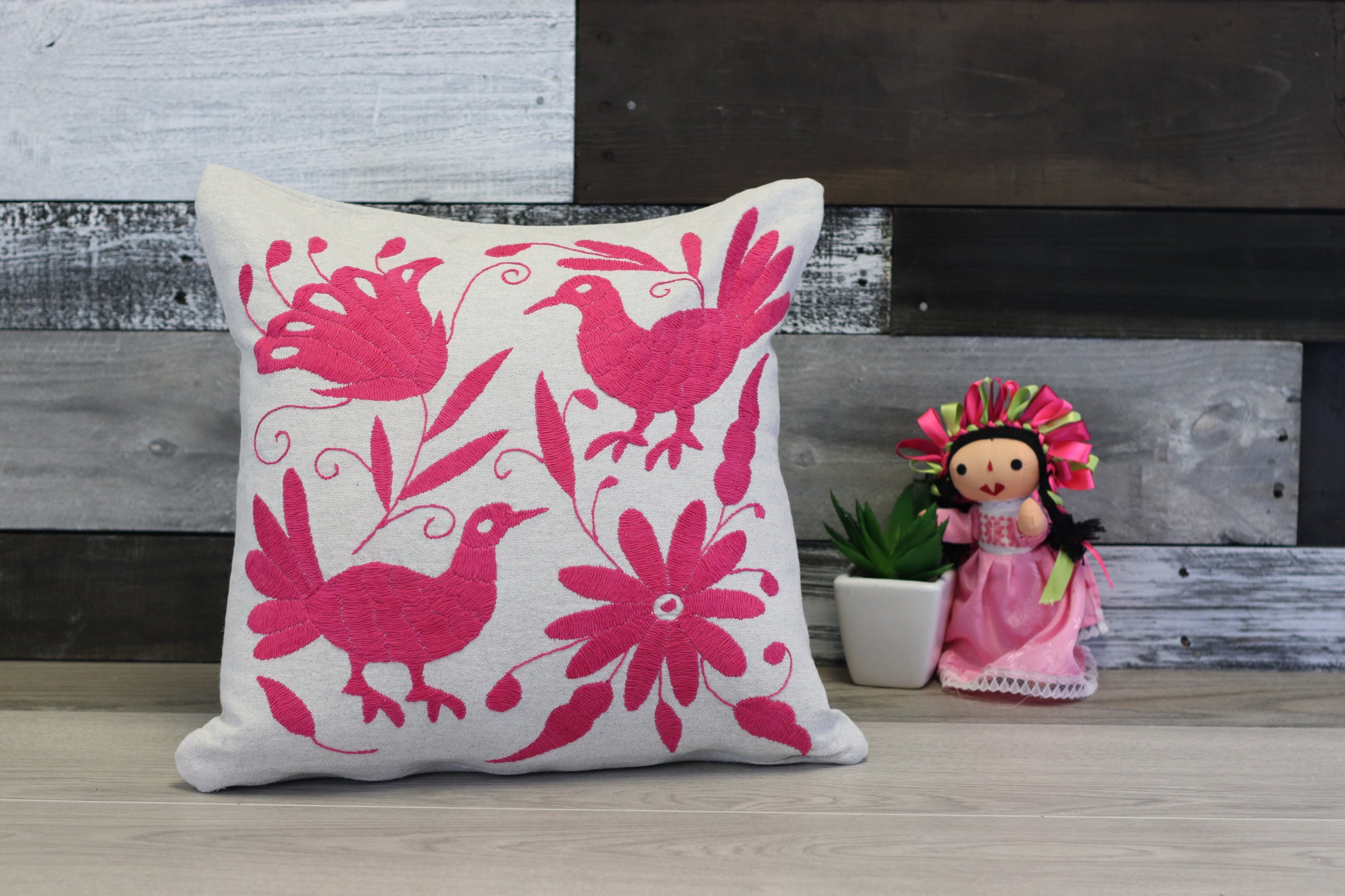 Pink Hand Embroidered Bird and Flower Pillow Cover on Gray Background. Handmade in Mexico. Ships from the USA. Buy now at www.felipeandgrace.com.  