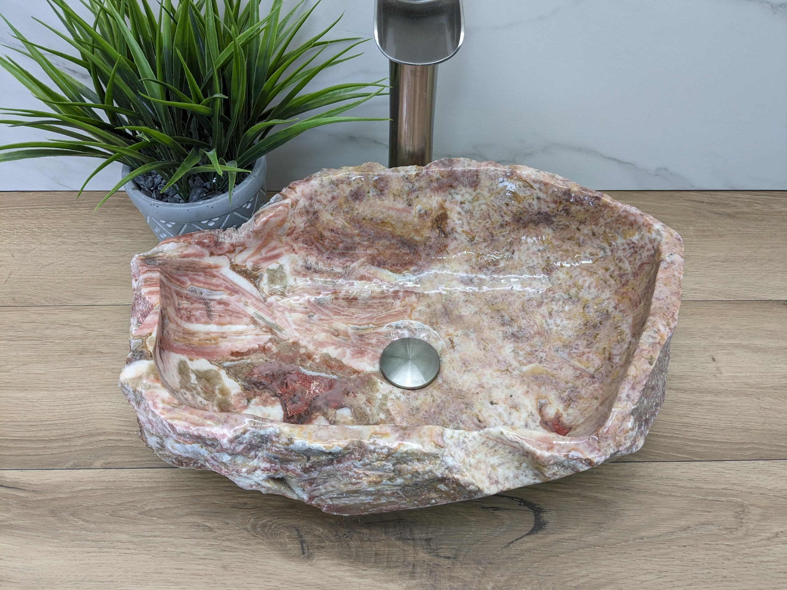 Pink and Tan Onyx Vessel Sink. Handmade in Mexico. We package and ship from the USA. Buy now at www.felipeandgrace.com. 