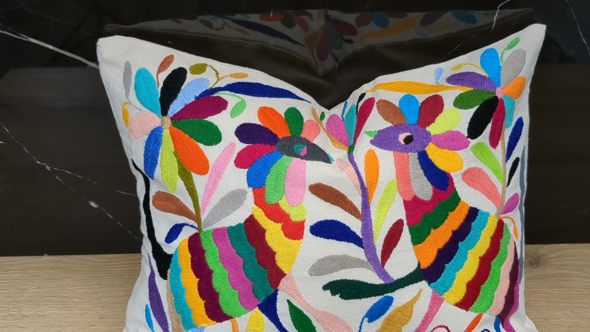 Rectangle Otomi Tenango Pillow Cover with Hand Embroidered Flowers and Animals in Vibrant Colors. Handmade in Mexico. We package and ship from the USA. Buy now at www.felipeandgrace.com.