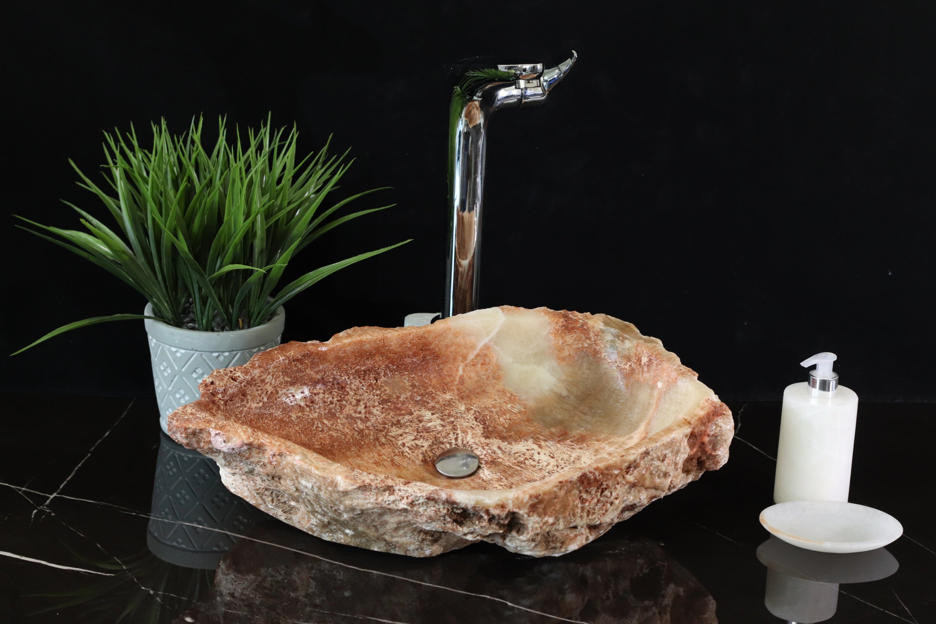 Pink, Red, and Ivory Onyx Stone Vessel Sink. A rustic, beautiful work of art. We offer fast shipping. Handmade in Mexico. We hand finish, package, and ship from the USA. Buy now at www.felipeandgrace.com. 