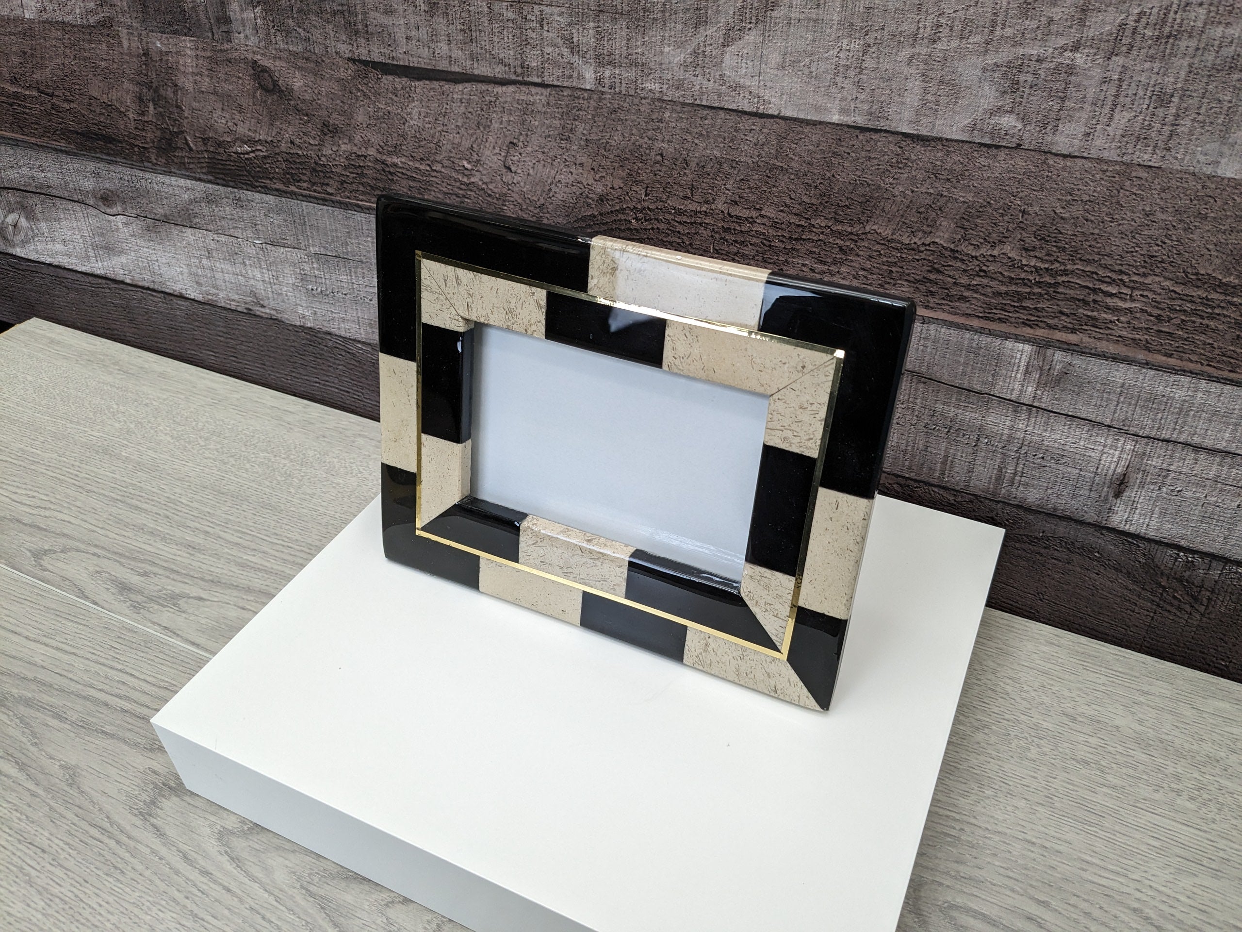 Black and Tan Check Pattern Onyx Frame with Gold Thin Line and Glass Covering. Travertine Stone Stand. Handmade in Mexico. We package and ship from the USA. Buy now at www.felipeandgrace.com.