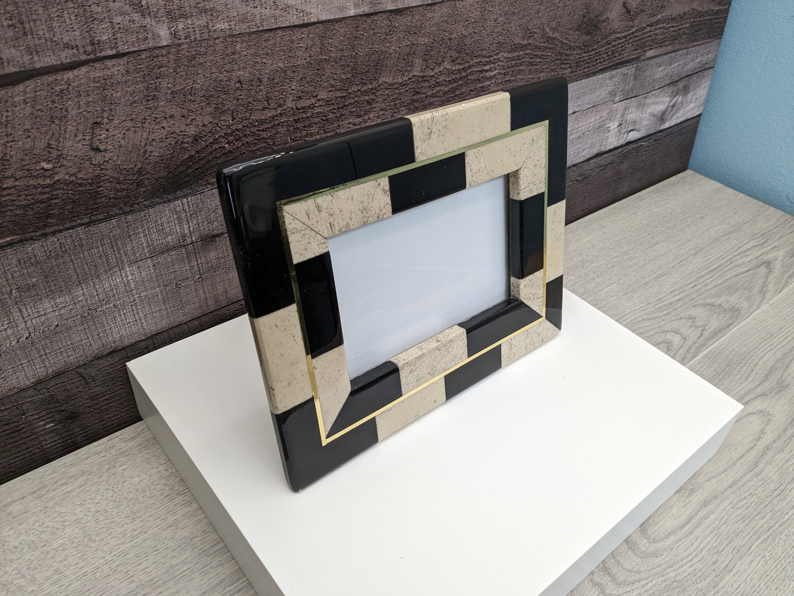 Black and Tan Check Pattern Onyx Frame with Gold Thin Line and Glass Covering. Travertine Stone Stand. Handmade in Mexico. We package and ship from the USA. Buy now at www.felipeandgrace.com.