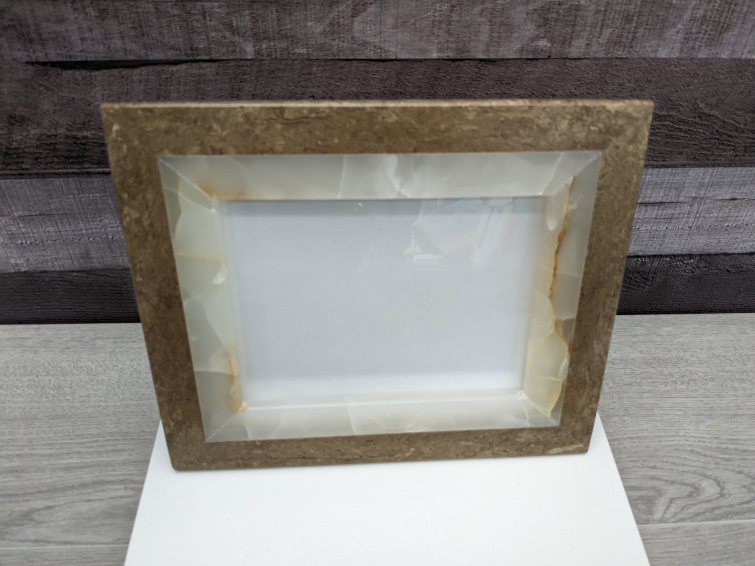 Travertine and Onyx Frame with Glass Covering and a Travertine Stone Stand. Handmade in Mexico. We package and ship from the USA. Buy now at www.felipeandgrace.com.