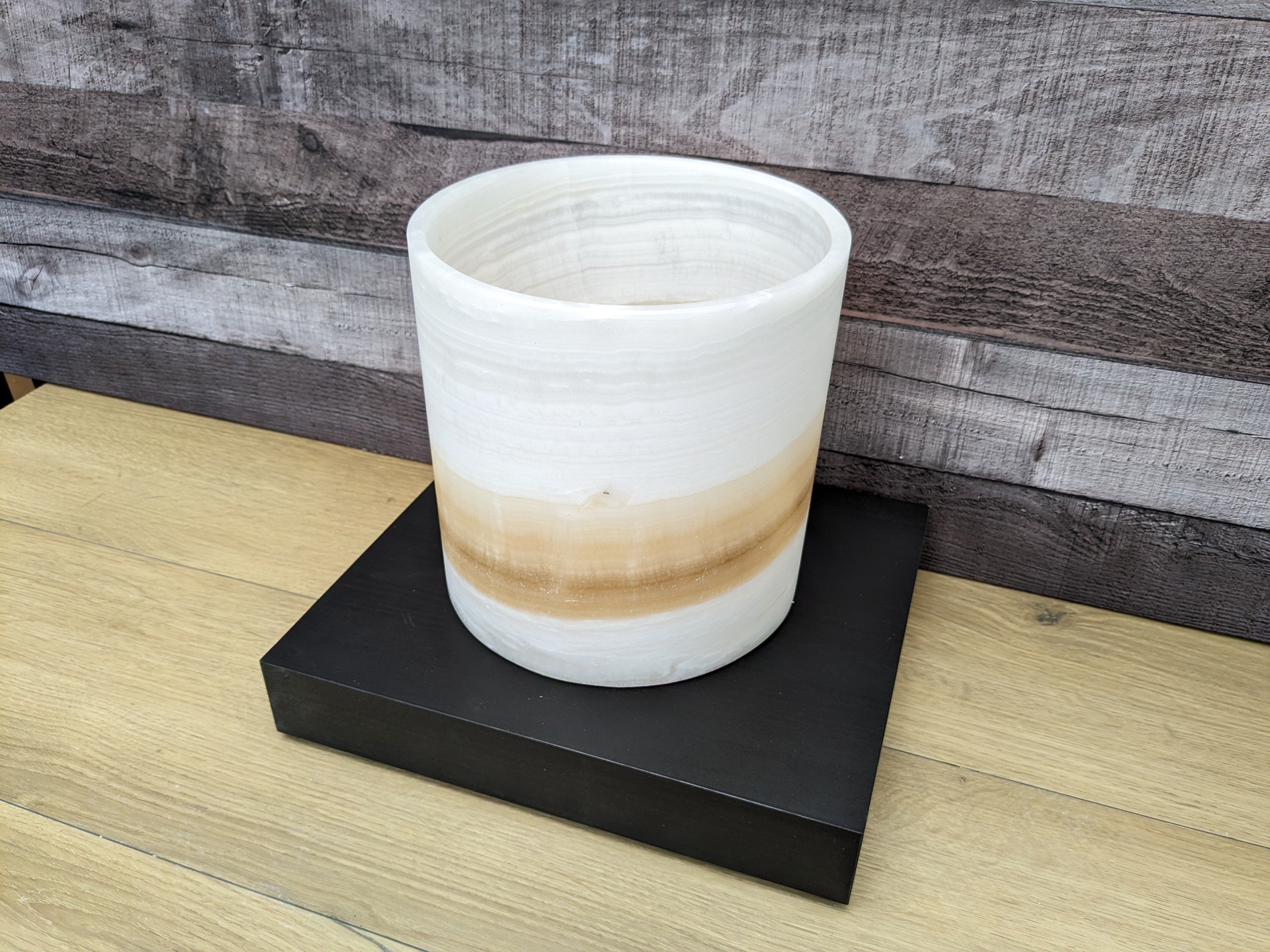 White Onyx Stone Trash Receptacle with Brown Stripe that Swirls Up. Handmade in Mexico. Ships from the USA. Buy now at www.felipeandgrace.com.