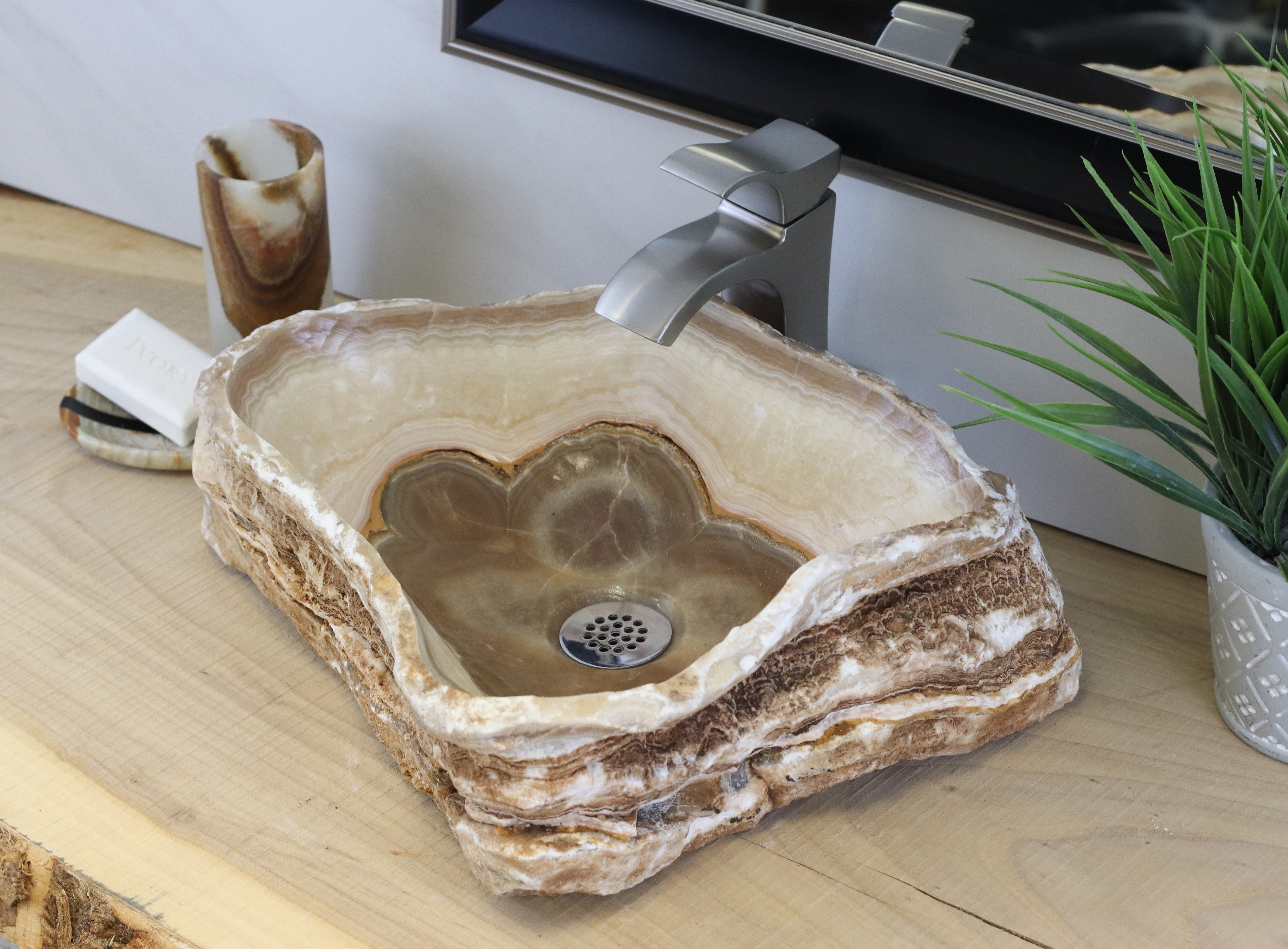 Brown and Tan Onyx Vessel Sink. A beautiful work of art. We offer fast shipping. Handmade in Mexico. We hand finish, package, and ship from the USA. Buy now at www.felipeandgrace.com. 