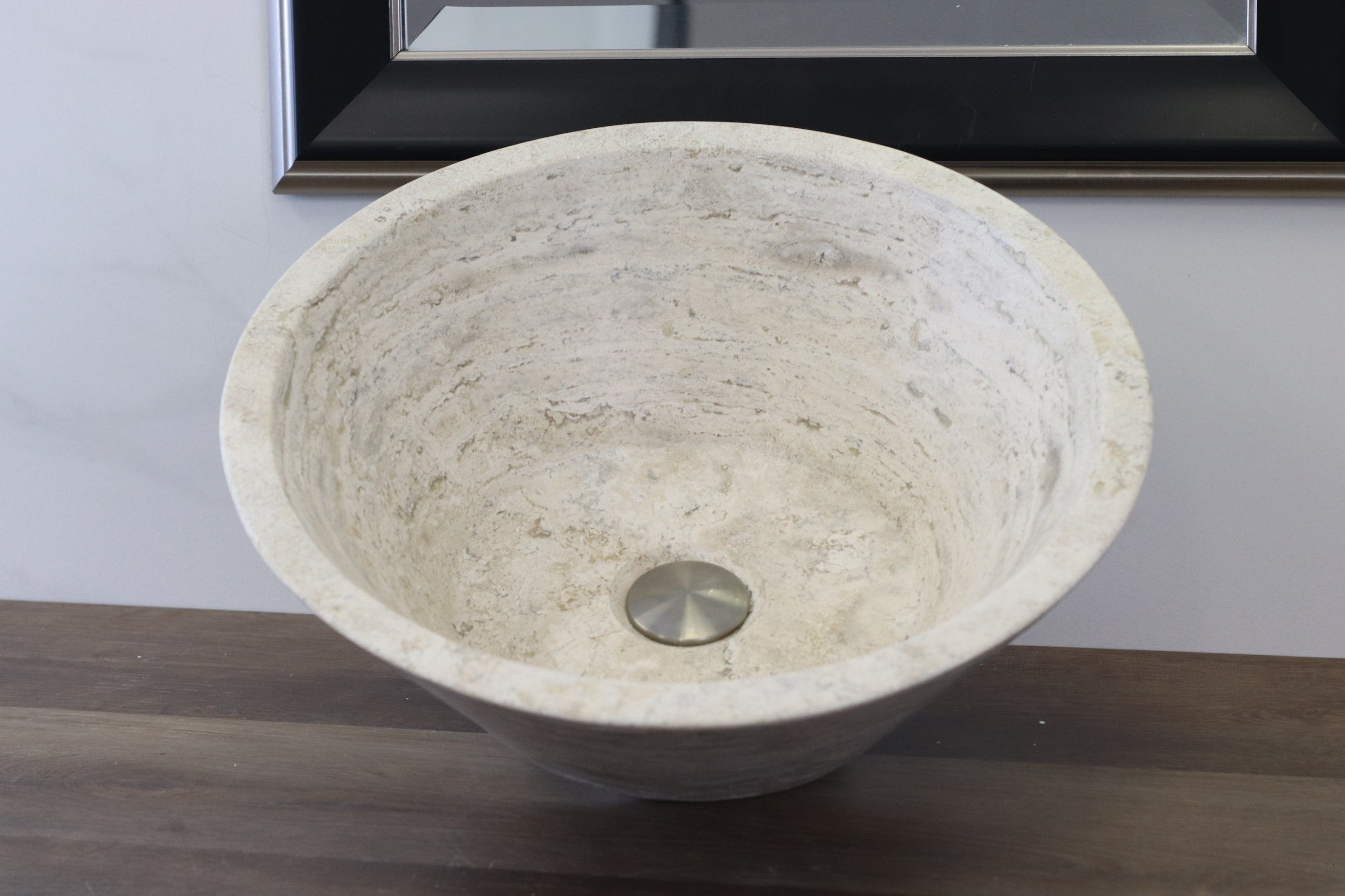 White Round Travertine Stone Vessel Above Counter Sink. Handmade in Mexico. Hand finished and ships from the USA. Buy now at www.felipeandgrace.com. 