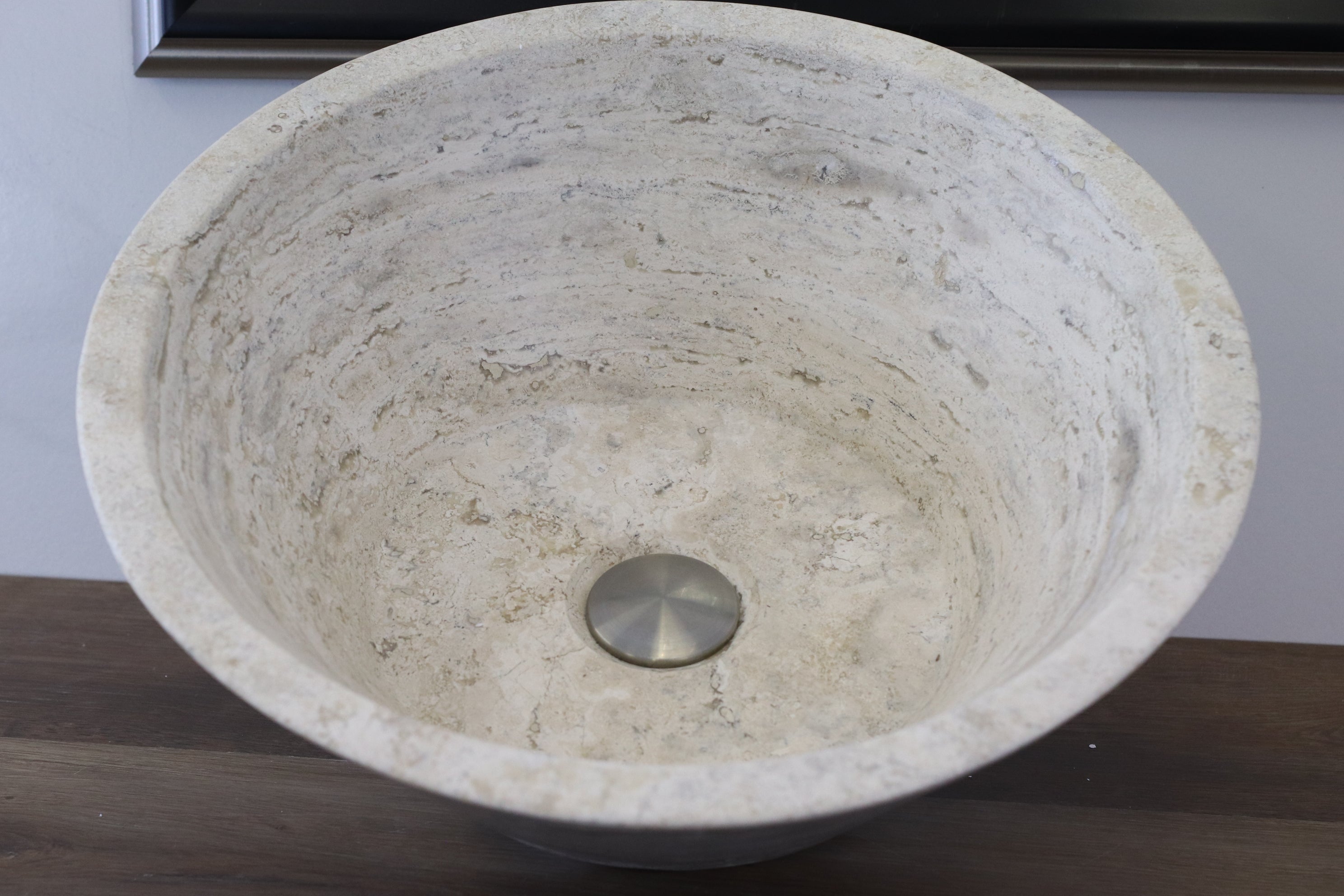 White Round Travertine Stone Vessel Above Counter Sink. Handmade in Mexico. Hand finished and ships from the USA. Buy now at www.felipeandgrace.com. 