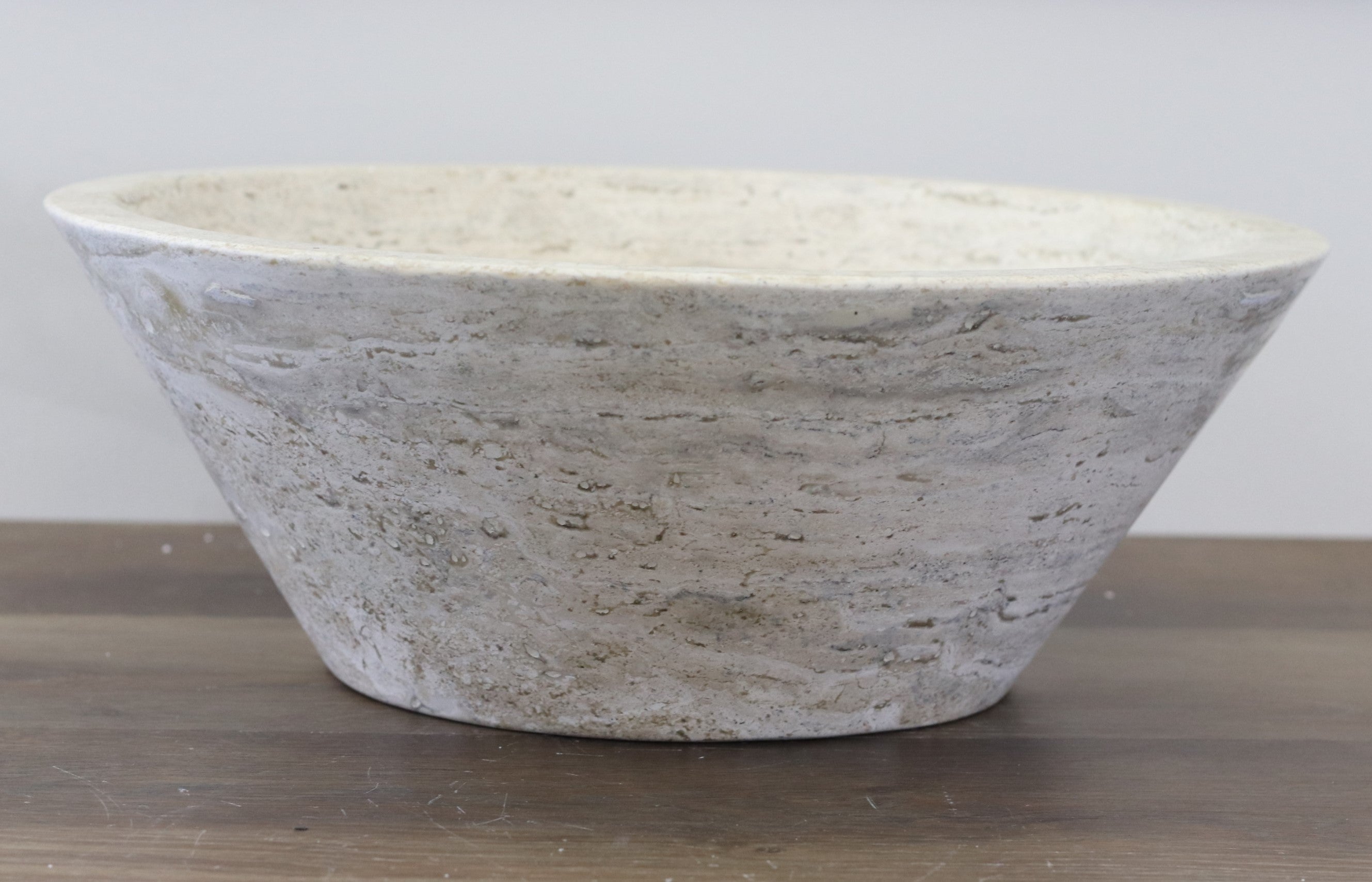 White Round Travertine Stone Vessel Above Counter Sink. Handmade in Mexico. Hand finished and ships from the USA. Buy now at www.felipeandgrace.com. 