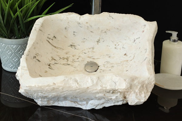 White onyx stone vessel sink. Handmade in Mexico. Ships from the USA. Buy now at www.felipeandgrace.com.