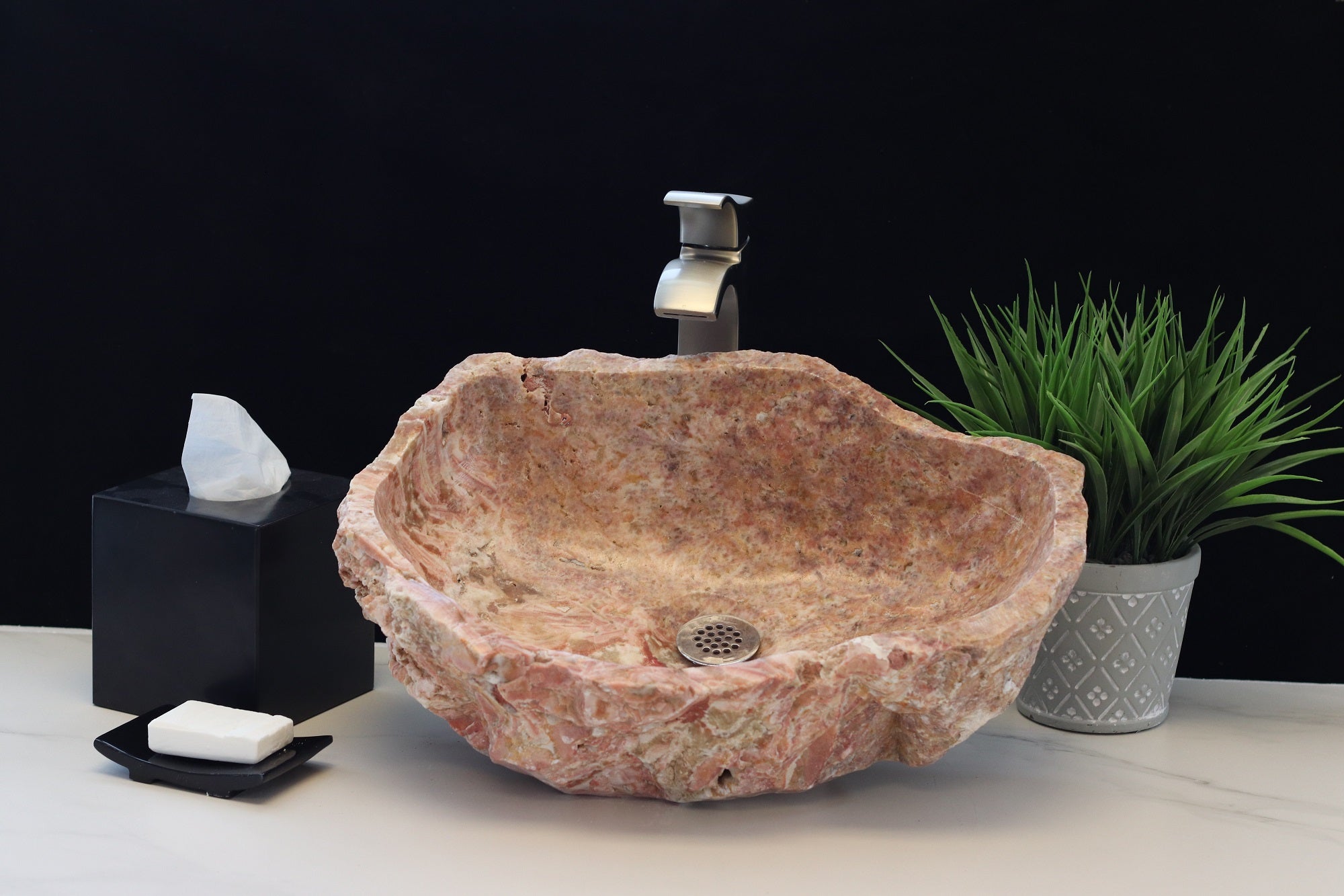 Pink and Beige Onyx Vessel Sink. A beautiful work of art. We offer fast shipping. Handmade in Mexico. We hand finish, package, and ship from the USA. Buy now at www.felipeandgrace.com. 