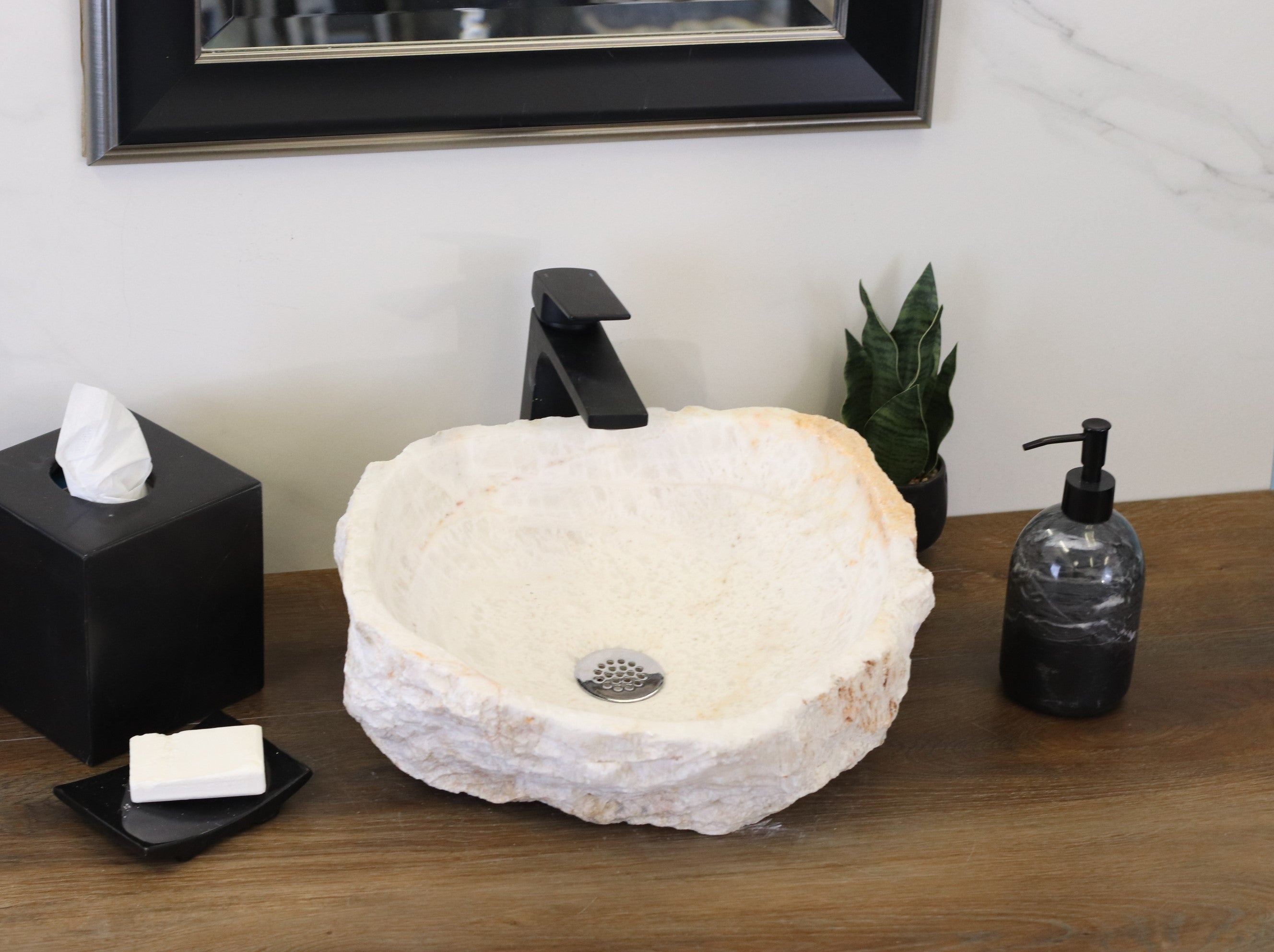 White Round Onyx Vessel Sink. A beautiful work of art. We offer fast shipping. Handmade in Mexico. We hand finish, package, and ship from the USA. Buy now at www.felipeandgrace.com. 