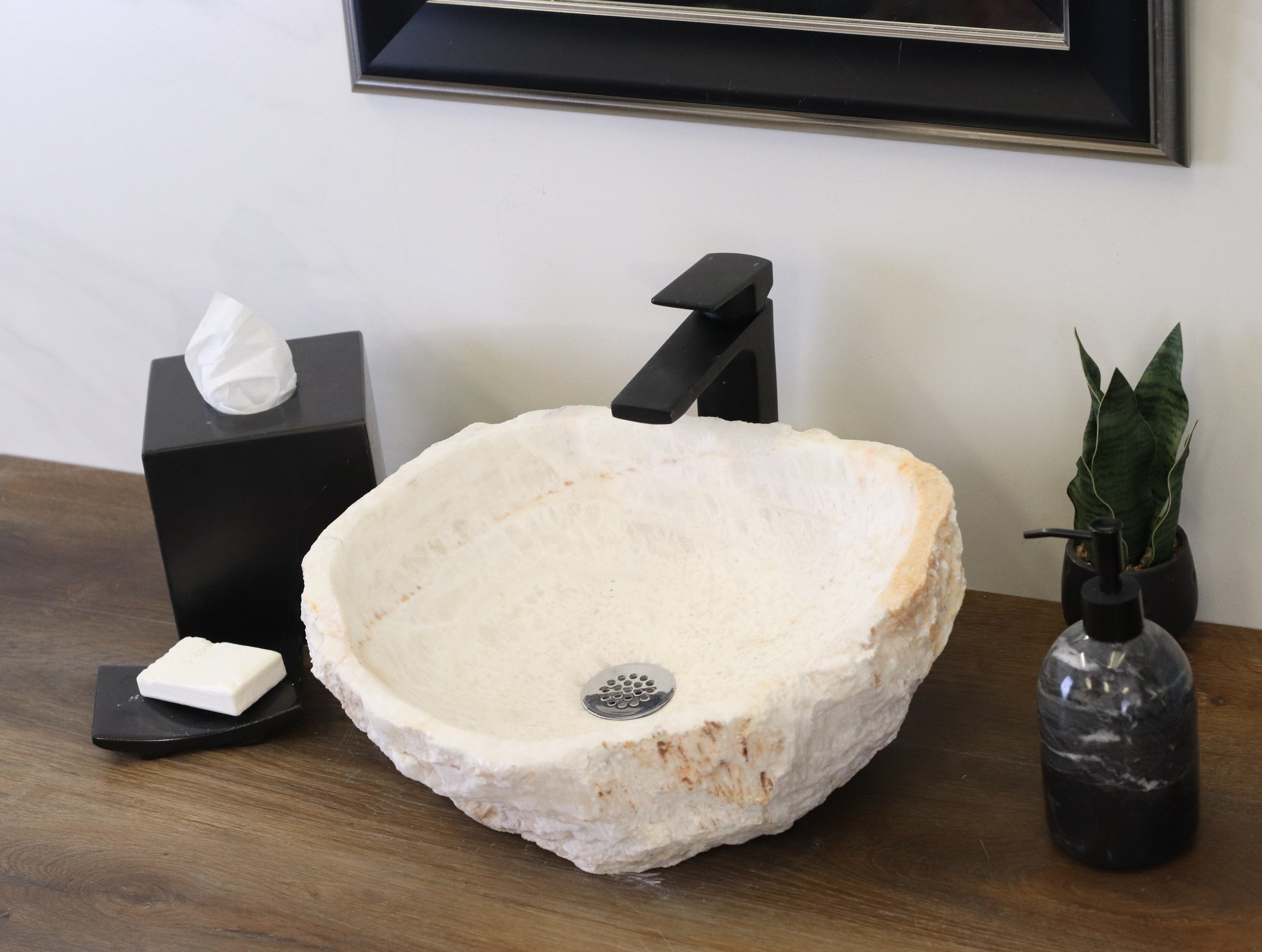 White Round Onyx Vessel Sink. A beautiful work of art. We offer fast shipping. Handmade in Mexico. We hand finish, package, and ship from the USA. Buy now at www.felipeandgrace.com. 