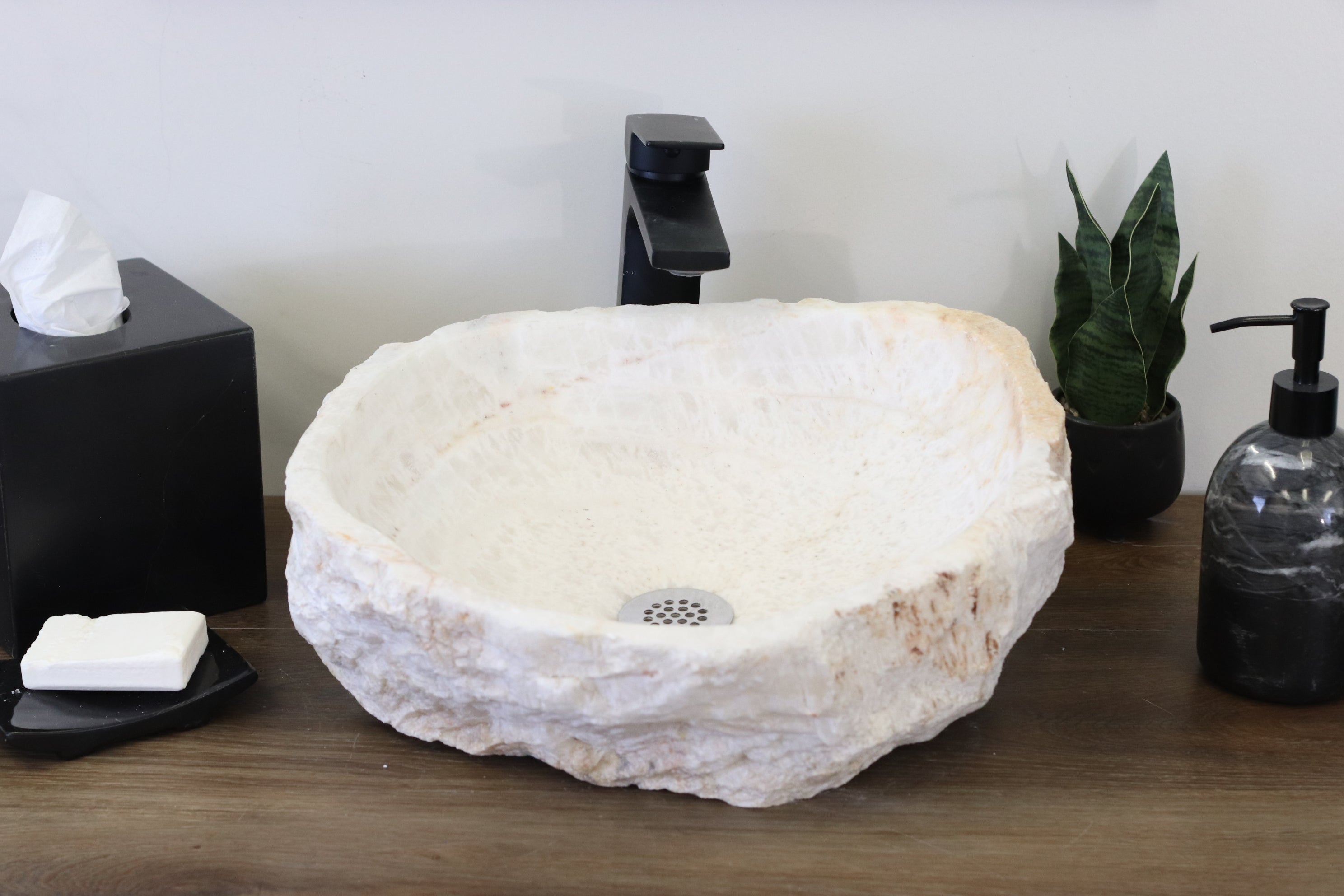 White Round Onyx Vessel Sink. A beautiful work of art. We offer fast shipping. Handmade in Mexico. We hand finish, package, and ship from the USA. Buy now at www.felipeandgrace.com. 