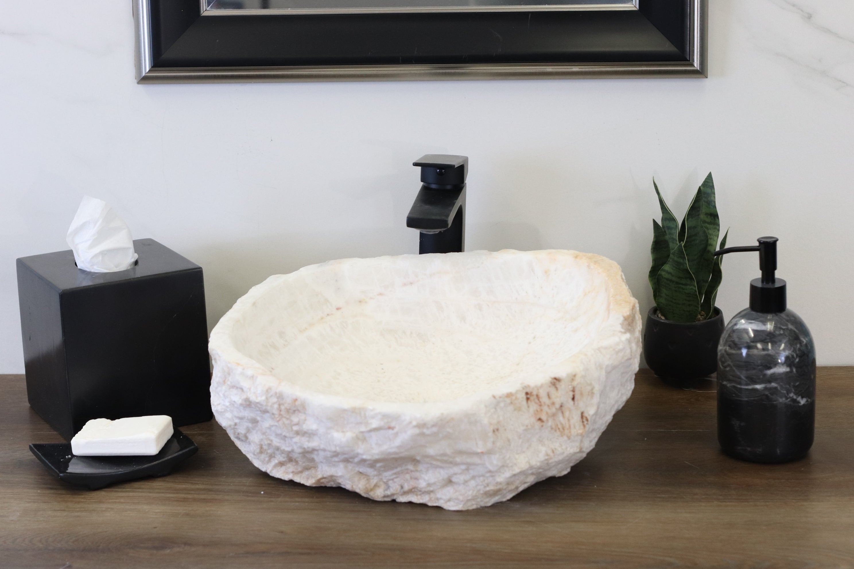White Round Onyx Vessel Sink. A beautiful work of art. We offer fast shipping. Handmade in Mexico. We hand finish, package, and ship from the USA. Buy now at www.felipeandgrace.com. 