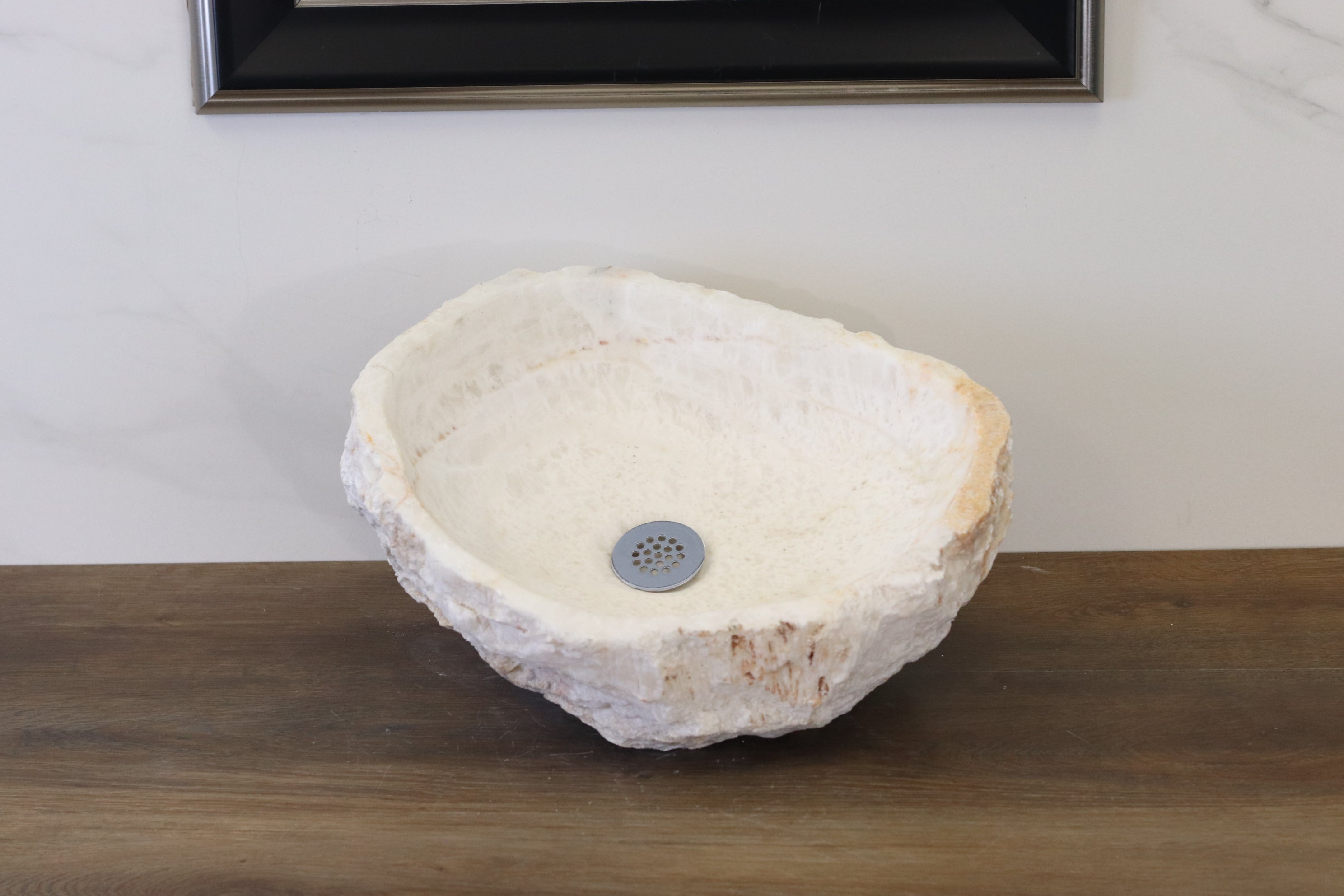 White Round Onyx Vessel Sink. A beautiful work of art. We offer fast shipping. Handmade in Mexico. We hand finish, package, and ship from the USA. Buy now at www.felipeandgrace.com. 