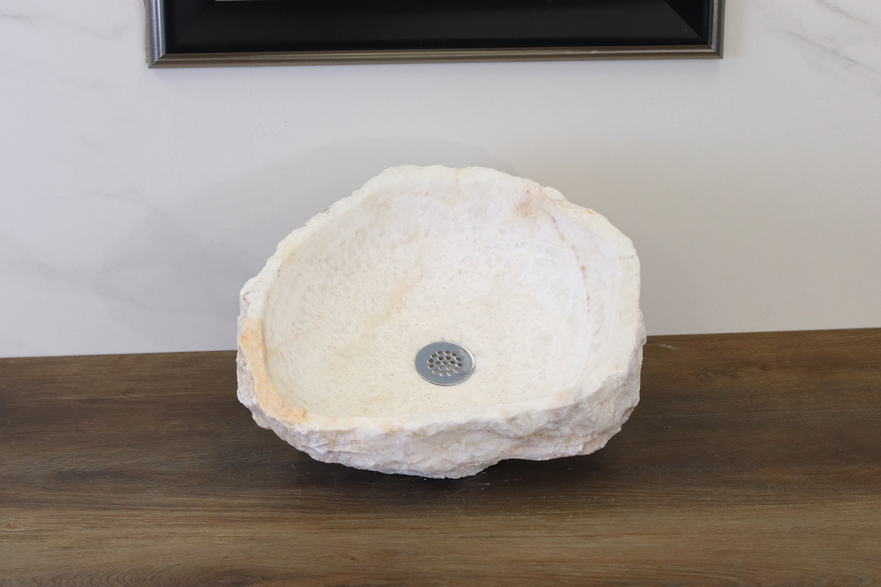 White Round Onyx Vessel Sink. A beautiful work of art. We offer fast shipping. Handmade in Mexico. We hand finish, package, and ship from the USA. Buy now at www.felipeandgrace.com. 