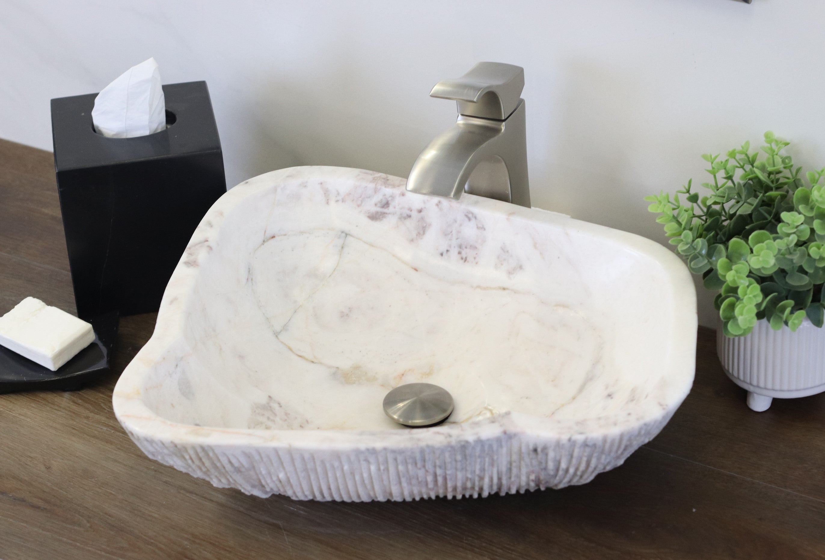 White Onyx Vessel Sink. A beautiful work of art. We offer fast shipping. Handmade in Mexico. We hand finish, package, and ship from the USA. Buy now at www.felipeandgrace.com. 