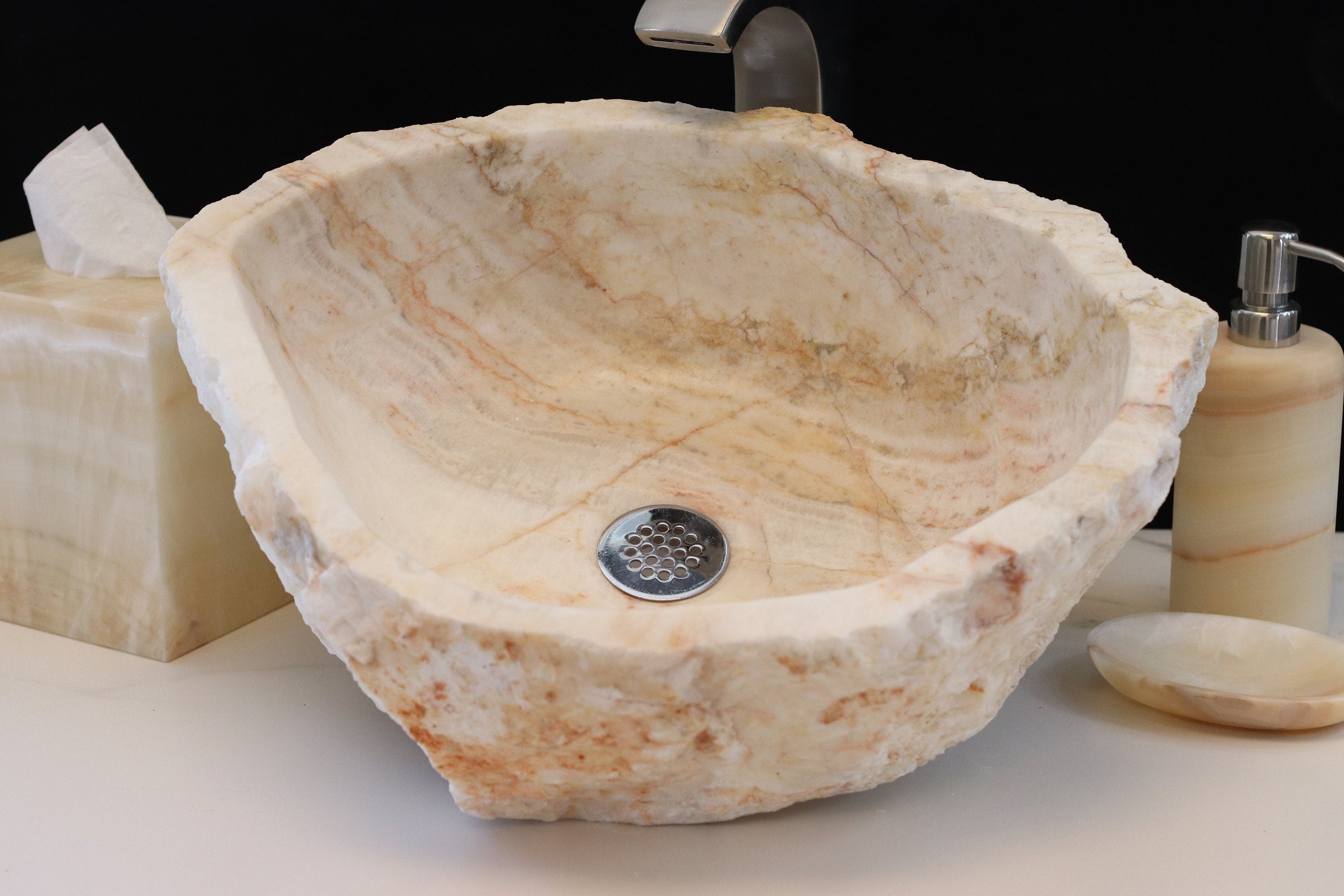 White and Beige Onyx Vessel Sink. Handmade in Mexico. We hand finish, package, and ship from the USA. Buy now at www.felipeandgrace.com. 